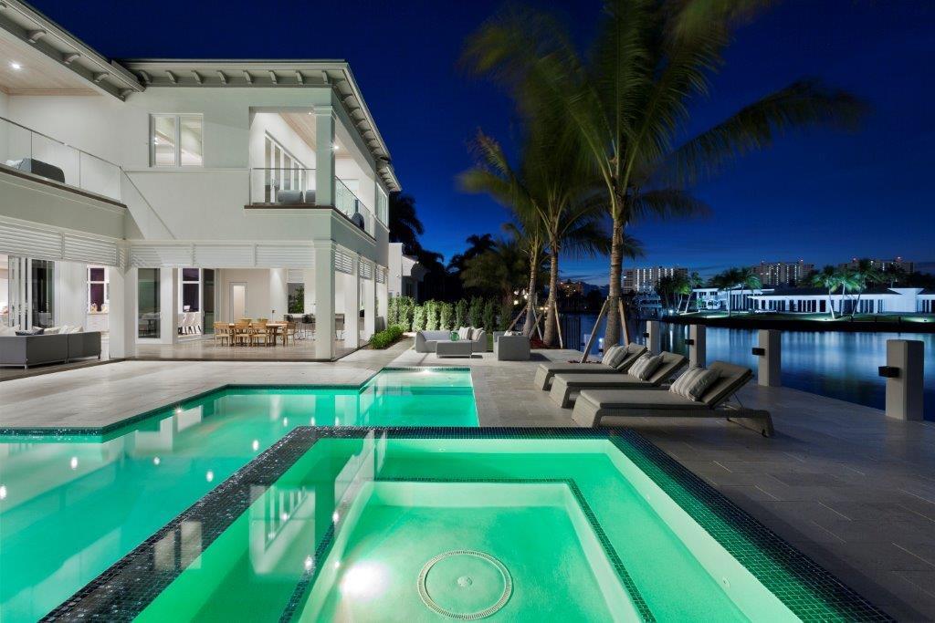 “New” Modern Coastal-inspired Royal Palm Grand Canal estate sited on 88 ± feet of deepwater by Hanna Homes and architecture by The Benedict Group.
Sleek glass double doors open to a dramatic foyer with floating sculptural wood staircase, great room with glass walls and modern display kitchen with two islands.
Expansive master retreat with his/her spa-like baths, wardrobes, exercise room and office.  Resort-style wraparound lanai with summer kitchen, cabana bath and sun splashed southeast pool.  Panoramic water views of the Grand Canal and Intracoastal.

Shown By Appointment only. DISCLAIMER: The written and verbal information provided including but not limited to prices, measurements, square footages, lot sizes, calculations and statistics have been obtained and conveyed from third parties such as the applicable Multiple Listing Service, public records as well as other sources. All information including that produced by the Sellers or Listing Company are subject to errors, omissions or changes without notice and should be independently verified by any prospect for the purchase of a Property.  The Sellers and Listing Company expressly disclaim any warranty or representation regarding all information.  Prospective purchasers' use of this or any written and verbal information is acknowledgement of this disclaimer and that Prospects shall perform their own due diligence.  Prospective purchasers shall not rely on any written or verbal information provided when entering into a contract for sale and purchase.  Some affiliations may not be applicable to certain geographic areas. If your property is currently listed, please do not consider this a solicitation.   In the event a Buyer defaults, no commission will be paid to either Broker on the Deposits retained by the Seller. "No Commissions Paid until Title Passes."    Buyer pays title insurance, Florida documentary stamps, and all other closing costs for New Construction and land use. Copyright 2016 Listing Company.  All Rights Reserved.