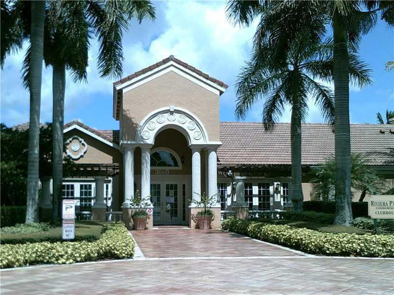 IMMACULATE! Beautiful, bright and airy 1st floor unit with lake views in the gated community of Riviera Palms. This spacious unit features tile floors throughout, an open functional kitchen, separate dining area, laundry room with washer/dryer, and a private porch. Large master bedroom with walk-in closet and dual-access bathroom, convenient for guests. Community amenities include tropical pool, gym, clubhouse, and event space. Centrally located in Coconut Creek near major roads, Promenade Plaza, restaurants, shopping, schools, parks, hospitals, casino, movie theaters, and beaches. Walking distance to the Promenade. Don't miss this move-in ready gem! FAST APPROVAL!!