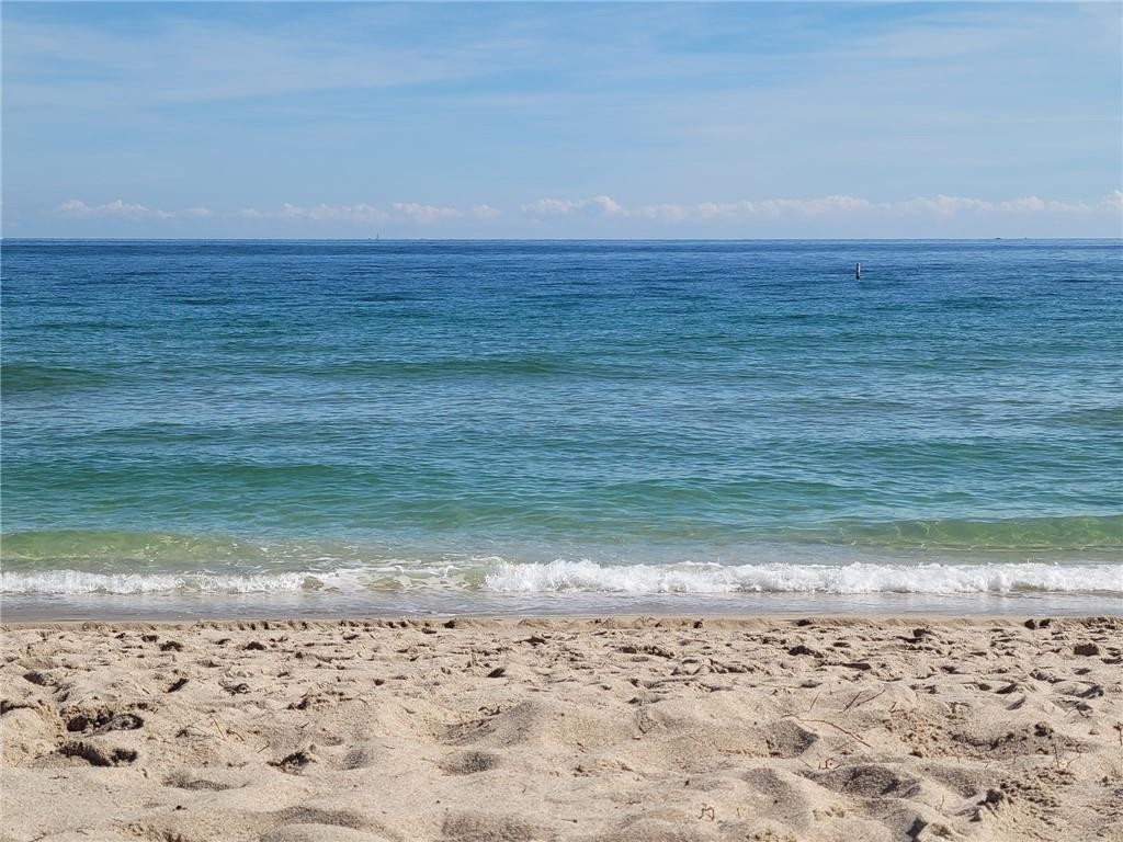One Block from the Most Amazing Beaches!   This is your opportunity to live right in the heart of the Quaint Seaside Town of Lauderdale by the Sea.  Almost 1,000 sf of living space to make your own!  This complex has only 12 units with very little turnover.  Large pool and gated area rounds out this small, 12 unit complex.  AC is 7 years old, Water Heater is 1 year old.  Old Florida Charm with Terrazzo floors!  Laundry facility on-site with large, new machines.  What a great opportunity to create your place in the sun!!