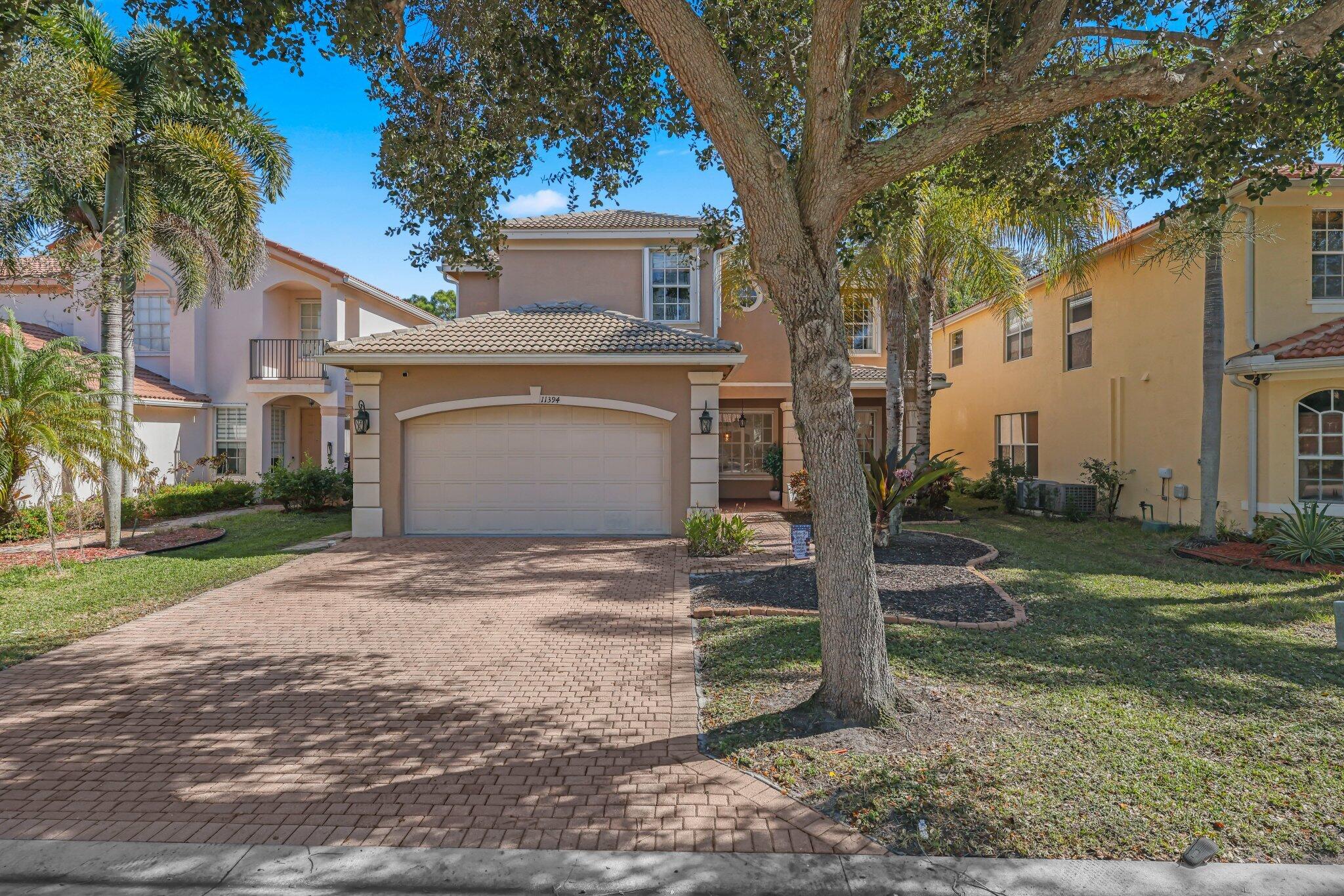 Welcome to 11394 Millpond Greens Dr in the sought-after Canyon Isles community. This spacious JADE model offers 6 bedrooms, 4 bathrooms, and numerous recent updates, including a fully repainted interior, brand-new flooring throughout the upstairs and downstairs bedrooms, and freshly painted white kitchen cabinetry. Designed for comfortable living and entertaining, the open-concept floor plan features generous living and dining spaces that flow into a well-appointed kitchen with granite countertops and ample cabinetry. The primary suite offers a walk-in closet and a luxurious bath with a soaking tub and separate shower. Five additional bedrooms provide plenty of flexibility for family, guests, or a home office.  Enjoy a peaceful backyard setting and access to Canyon Isles' resort-style amenities, including a clubhouse, pool, fitness center, tennis courts, and more. Conveniently located near top-rated schools, shopping, dining, and entertainment, this home is an exceptional opportunity in one of Boynton Beach's premier communities.