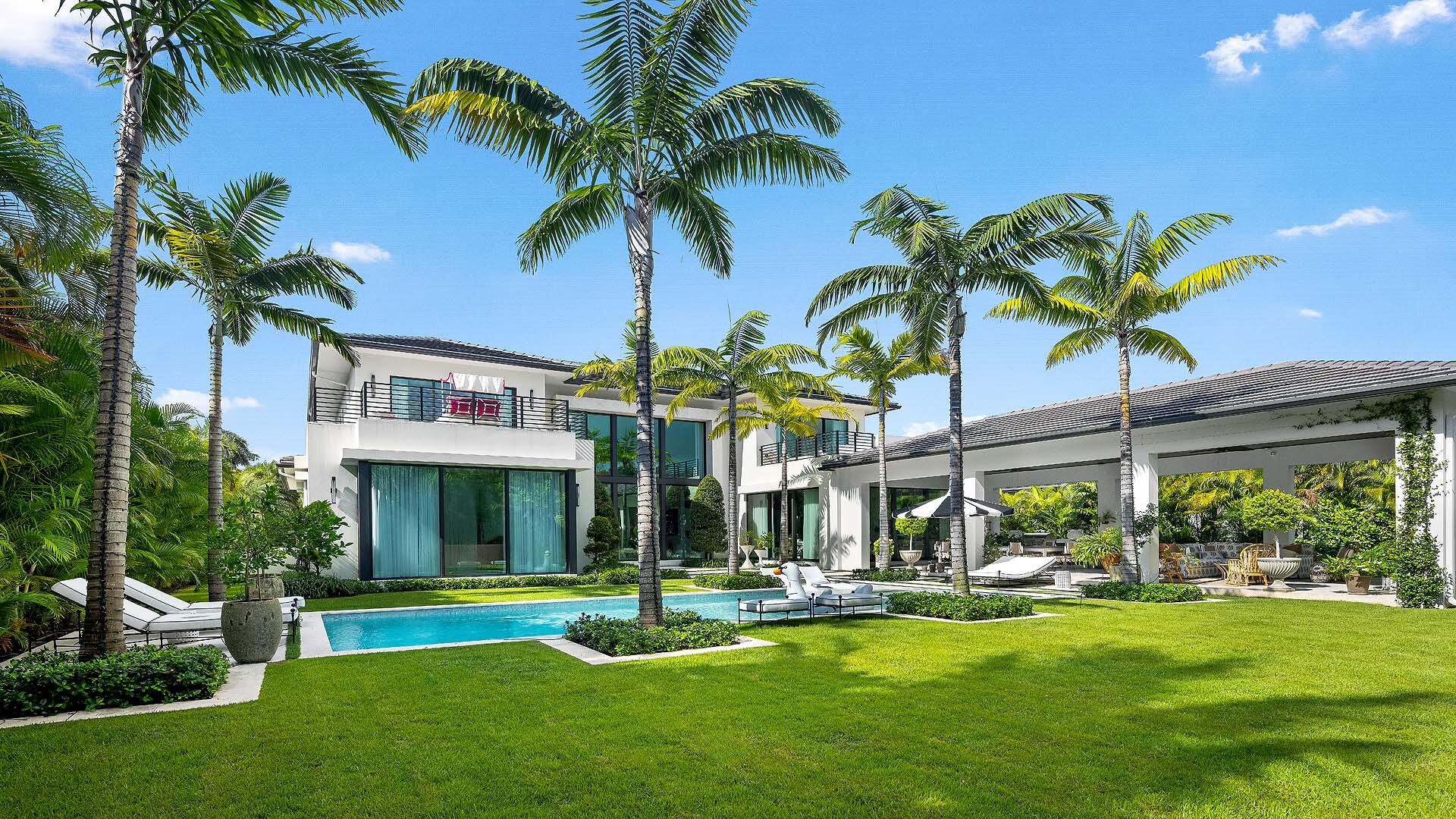 Beautifully finished and move-in ready, this like-new residence offers a rare opportunity just moments from the pristine beach's in the coveted Town of Ocean Ridge. Set on nearly a 17,000-square-foot lot, this home features soaring ceilings, a first-floor primary suite, and abundant natural light throughout. Professionally decorated with custom wall coverings and elegant window treatments, every detail has been thoughtfully curated. Enjoy a resort-style pool and spa, expansive covered outdoor living area, four-car garage, and the added peace of mind with Ocean Ridge's dedicated police department. Just minutes from the renowned dining and shopping of Delray Beach and Palm Beach, private clubs, and international airports, this is coastal luxury at its finest. Move right into a like-new coastal residence where timeless architecture meets professionally curated interiors. Set on nearly a 17,000-square-foot lot just moments from the beach, this exceptional five-bedroom home showcases soaring ceilings, expansive living spaces, a first-floor primary suite, and abundant natural light. Offering an effortless lifestyle, it is a rare opportunity to enjoy a designer-finished home in one of Ocean Ridge's most desirable locations. Thoughtfully decorated with custom wall coverings and elegant window treatments that bring warmth, sophistication, and cohesion throughout the home. Beautifully finished and completely move-in ready, the residence offers the luxury of enjoying a professionally designed home without the time, expense, or uncertainty of decorating from scratch. Designed for both relaxed everyday living and exceptional entertaining, the expansive covered outdoor living area overlooks a resort-style pool and spa, all surrounded by beautifully landscaped grounds that enhance the home's private, estate-like setting. A four-car garage and full-house generator provide comfort and convenience, while the Town of Ocean Ridge offers the added peace of mind with its own dedicated police department. Just minutes from pristine beaches, world-class dining, shopping, and private clubs, this is coastal luxury at its finest.