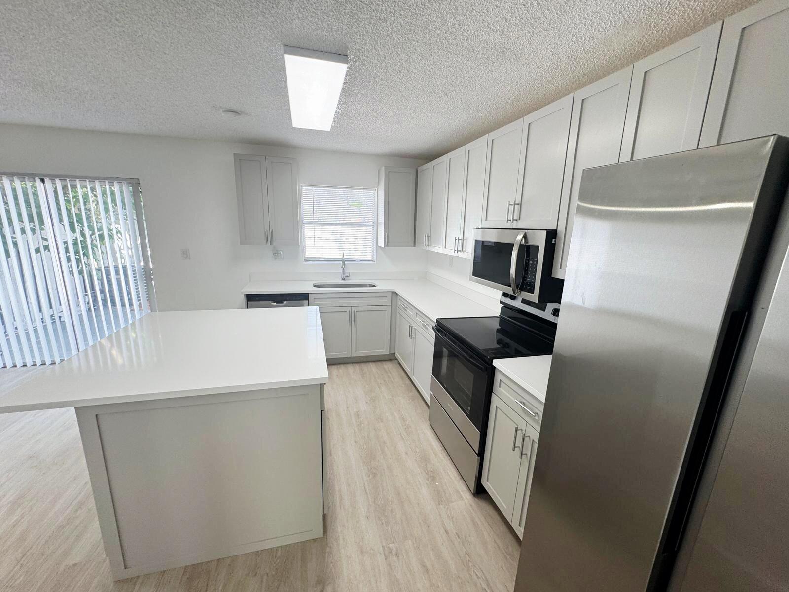 WOODSIDE ARMS CONDO - Residential