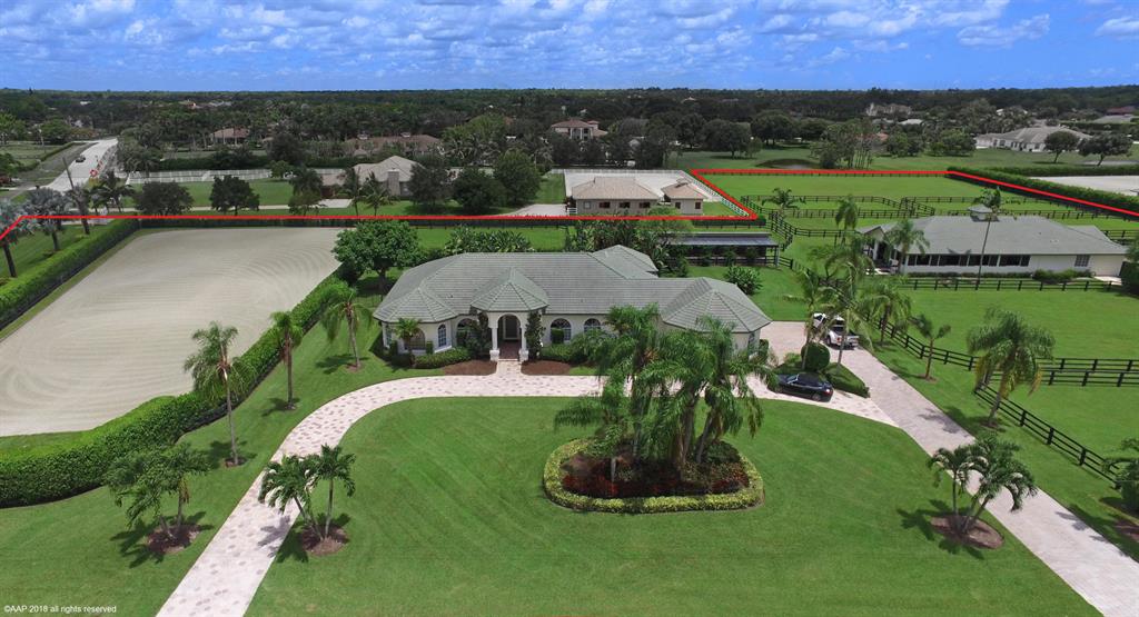 Pristine Saddle Trail farm on almost 5 acres, on the bridle path, a short hack to WEF, features a spacious, bright pool home with 4 BD/4 BA plus 2 barns totaling 12 stalls. Fly spray system, 2 AC tack rooms, 2 wash stalls with hot/cold water. 12 irrigated paddocks, 26,000 sqft GGT arena and 30,000 sqft grass jump field. Completely renovated in 2015, this home features a gourmet kitchen with gas range, double ovens, and microwave all by Wolf, Sub-Zero fridge, 2 Sub-Zero wine fridges, and 2 Asko dishwashers. Upgrades throughout the house include travertine floors, solid core doors, nickel finishes, cast iron bathtubs, custom millwork, whole house Sonos system, security cameras. The entire property runs off of a RO water treatment system and features a generator that runs the house & barns. Main barn also includes 1 studio apartment.