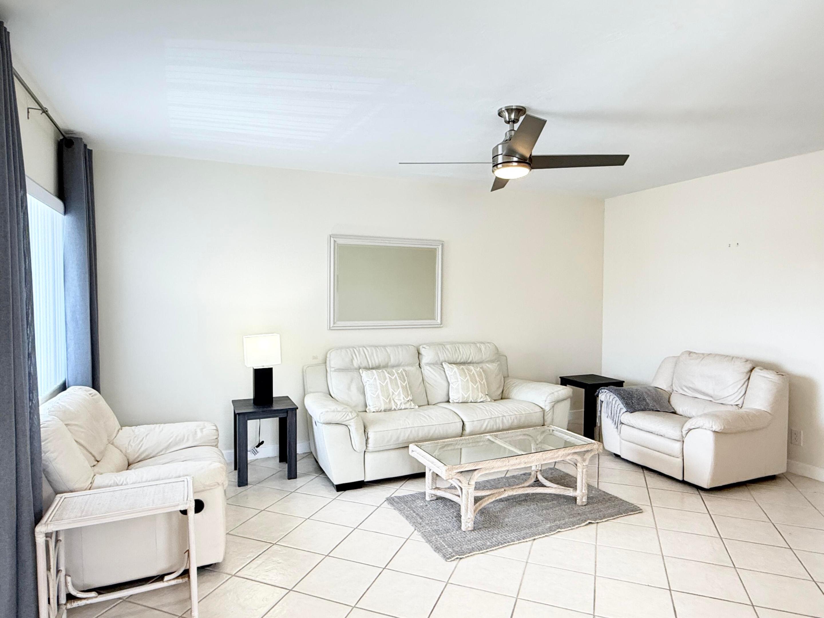 Beautifully upgraded and fully furnished 2BR/2BA condo on the 2nd floor in the desirable 55+ Murray Hills community. Bright new kitchen with partial lake views and brand new appliances. Laminate flooring in bedrooms; tile in living areas—no carpet. Central A/C, accordion shutters, basic cable and internet included. No pets. One assigned parking. Enjoy resort-style amenities: pool, gym, saunas, bocce, shuffleboard, library, billiards, auditorium, arts & crafts room, car wash, plus scenic walking and biking paths around Lake Osborne. Prime location minutes to the beach, shopping, dining, and downtown West Palm Beach.