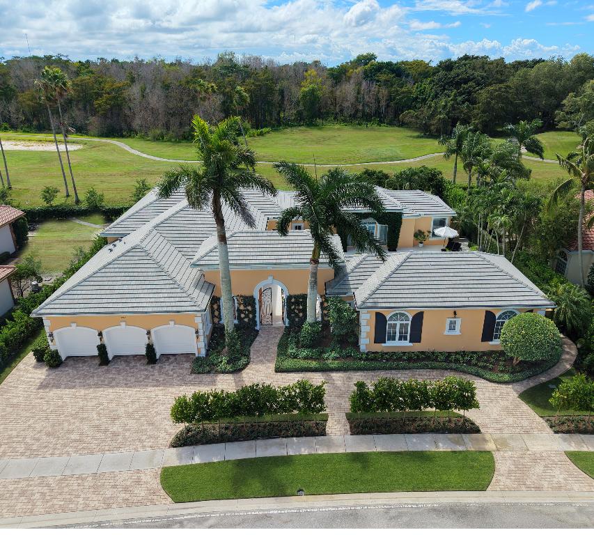 This Mizner Estates home with Southern exposure offers a timeless courtyard design, refined landscaping, and a prime location near the West Gate. Featuring a guesthouse, serene Cypress Preserve views, and expansive outdoor living, this 5-bedroom residence lives like an estate. Impeccably maintained and in pristine condition, it boasts a new roof and full impact glass throughout. A rare opportunity to enjoy privacy, elegance, and lasting value in one of the Polo Club's most sought-after locations.