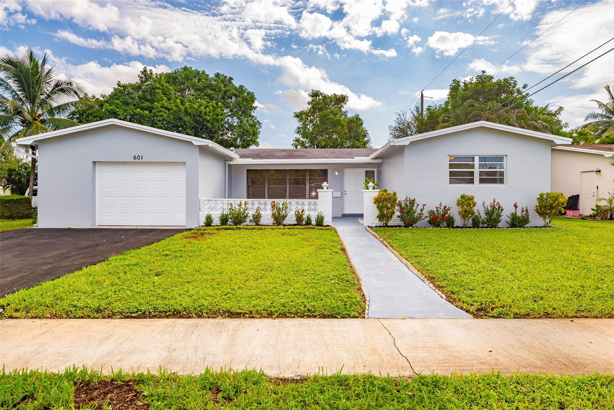 Dive into this captivating single-story gem, sprawling over a massive 2,310 sq ft. Perfectly tailored for families or savvy investors, this home showcases a legal 4-bedroom layout, two versatile dens—one potentially lucrative with private access. Relish in a kitchen transformation complete with brand-new appliances. Freshly painted inside and out, its allure is undeniable. Revel in upgrades: sleek high hats, chic doors, ceiling fans, and a revamped driveway. The exterior is a visual treat with a new fence, lush landscaping, and a three-zone AC. Nestled on a prime corner lot with minimal traffic, and protected by a roof just 5 years young. Truly a masterpiece!
