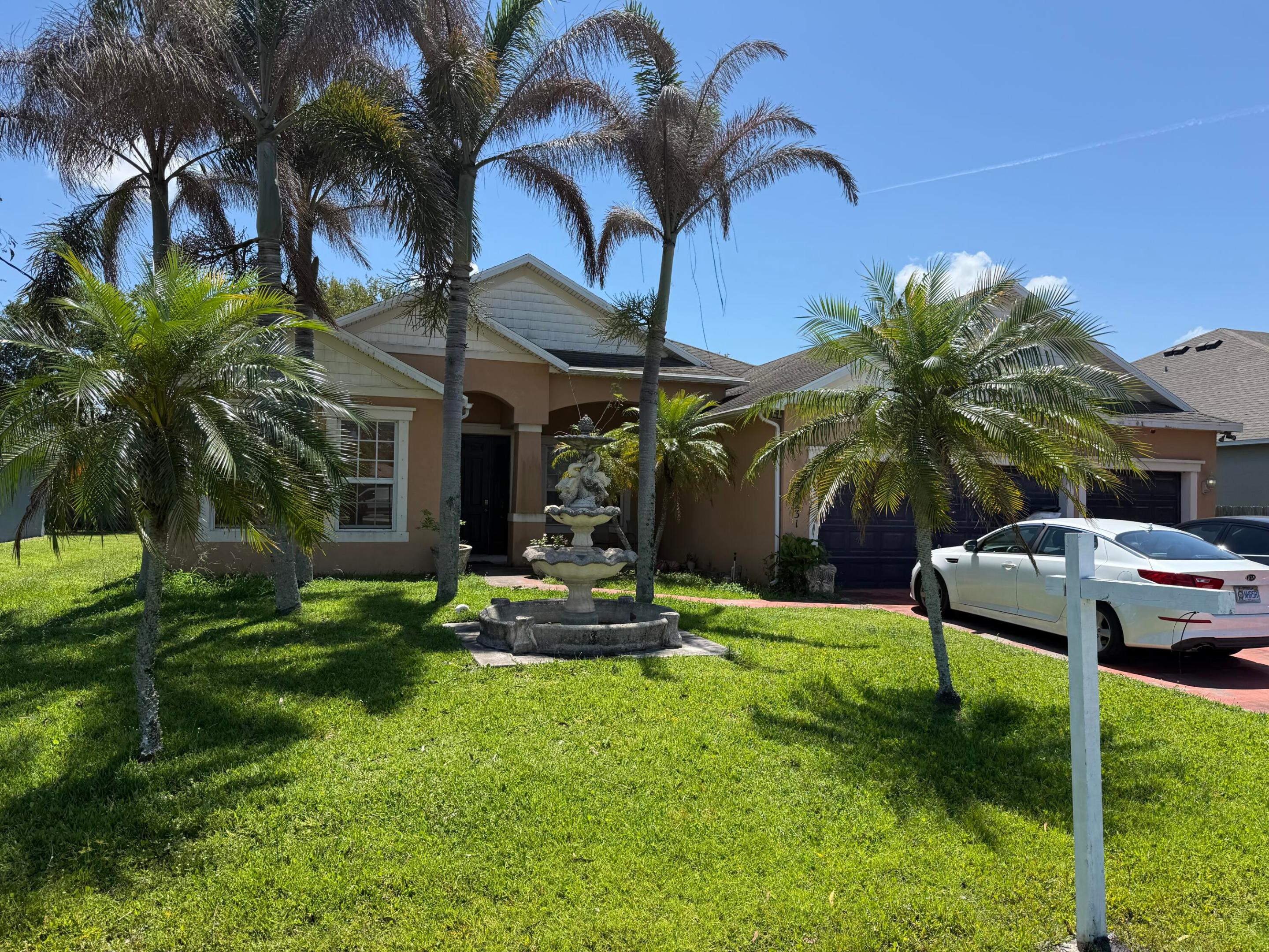 Investor Special in desirable Torino area of Port St. Lucie! Spacious CBS home with incredible upside potential for investors or cash buyers looking for a renovation project. Features include an oversized kitchen with granite countertops and custom cabinetry, formal dining area, screened patio, split floor plan, and 3-car garage. Property needs significant repairs and updates including likely roof replacement, ceiling repairs, one non-functioning A/C unit, flooring repairs/replacement, and completion of a fully demoed bathroom renovation. Sold AS-IS. Cash only. Great opportunity to restore and customize this home in a sought-after location near I-95, shopping, dining, schools, and more. Bring your contractor and vision!