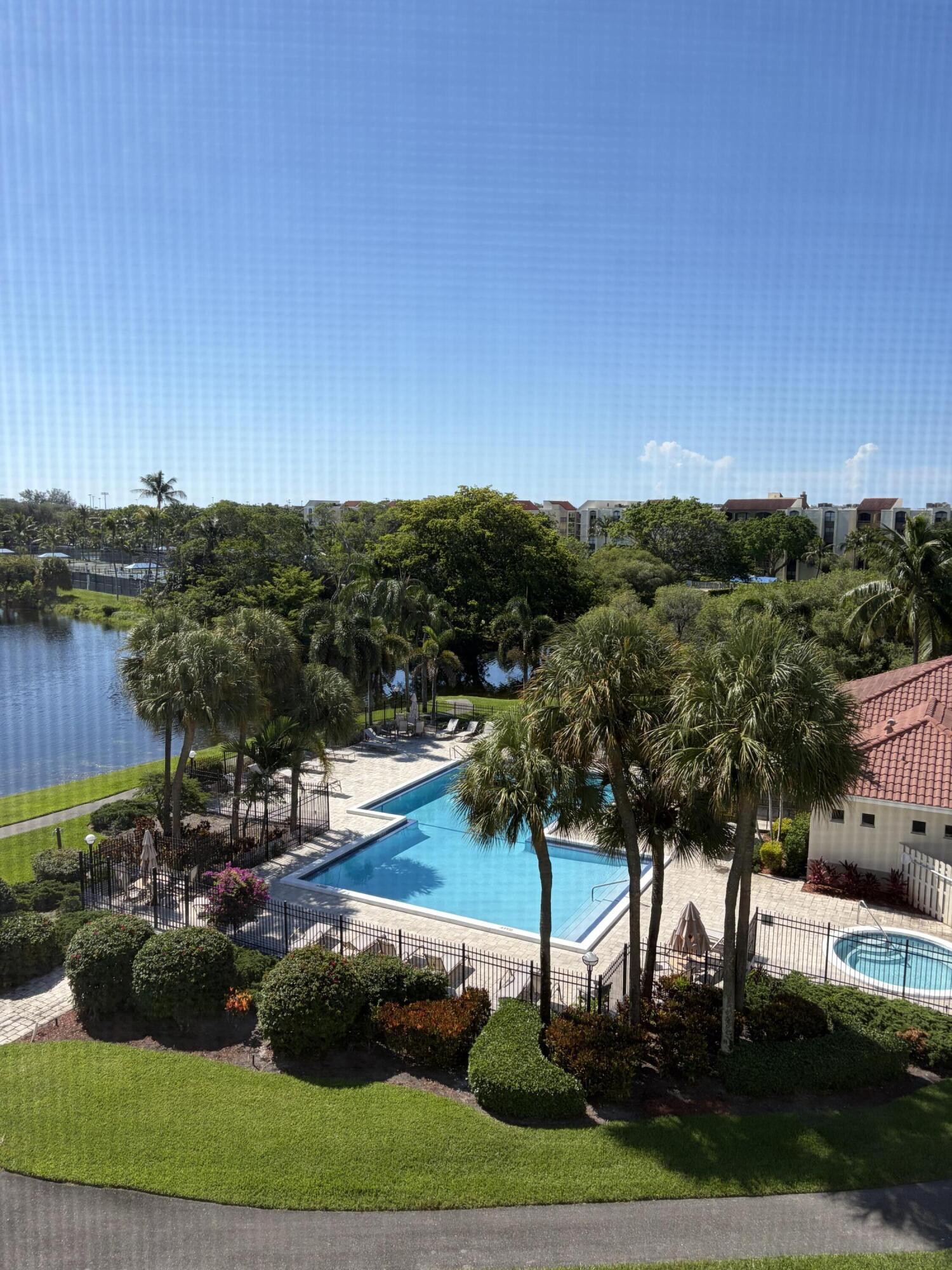 The waterfront views of this penthouse level Lakeside condominium will captivate you. The screened porch overlooks the lake, pool, hot tub and clubhouse. The stunning new open kitchen with a large quartzite island and lots of cabinets make it home. The bathrooms are updated. The neutral colors throughout are tasteful and make for easy living.  Lakeside is a welcoming all-ages community.  This bright and spacious two-bedroom, two-bathroom residence is close to I-95, only @7 minutes to the beach and within walking distance to Whole Foods and Target. The vibrant Atlantic Avenue in Delray Beach with fantastic restaurants and shopping is only a couple miles away. Call today to arrange a private showing!