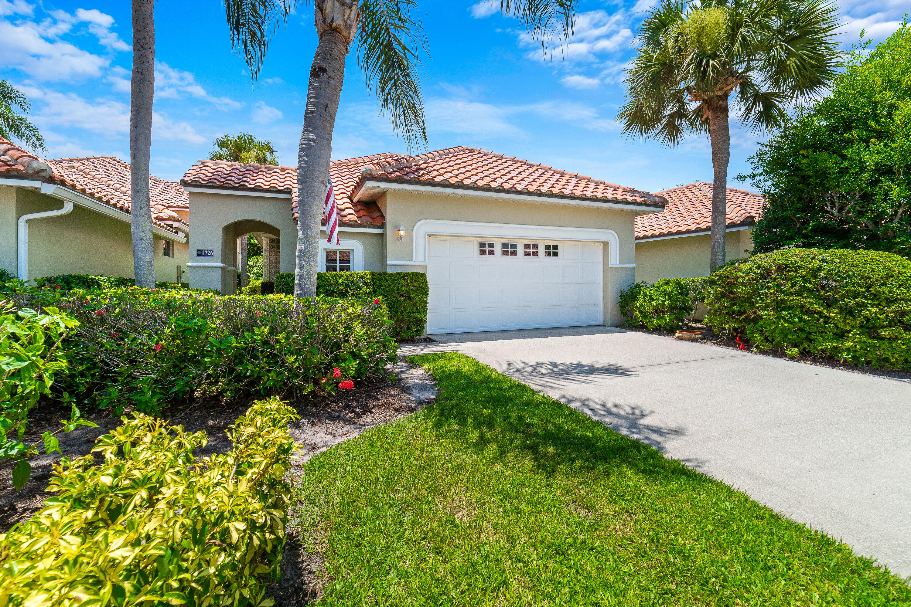 Discover the ideal opportunity to enjoy the active lifestyle of Grand Harbor Golf & Beach Club, one of Vero Beach's premier private communities. Perfectly positioned on the desirable east side of the neighborhood, this one-owner former builder's model offers a peaceful setting away from the main entrance, while remaining a short distance from the pool. Overlooking a tranquil pond connected to the community's network of waterways, the home enjoys scenic views within Grand Harbor's Audubon Society-recognized natural preserve. The thoughtfully designed residence features two bedrooms plus den, two bathrooms, a two-car attached garage, and tile flooring throughout. The spacious primary suite includes a luxurious bath with dual vanities, a soaking tub, and a separate walk-in shower.  Recent updates provide added value and peace of mind, including a new Rheem 40-gallon water heater (January 2025), LG dishwasher (October 2024), and Whirlpool side-by-side refrigerator with ice maker and water dispenser (2023). Designed by Peacock + Lewis, Grand Harbor Golf & Beach Club is nationally recognized for its exceptional service, amenities, and member experience. Residents enjoy access to championship golf, tennis, a private beach club, waterfront amenities, a pro shop, fitness center with classes, onsite spa, card room, restaurant and bar, open-air and balcony dining overlooking the golf course, meeting and private event spaces, a resort-style pool with sun shelf, lap lanes and hot tub, gazebo bar, and a serene Zen garden overlooking the Indian River Lagoon. Additional highlights include a 24-hour guard-gated entrance, pet-friendly community, leasing permitted twice per year with a 30-day minimum, and HOA services that include lawn care, landscaping, pool maintenance, cable, and internet. Home comes fully furnished. Club membership is required with the sale.