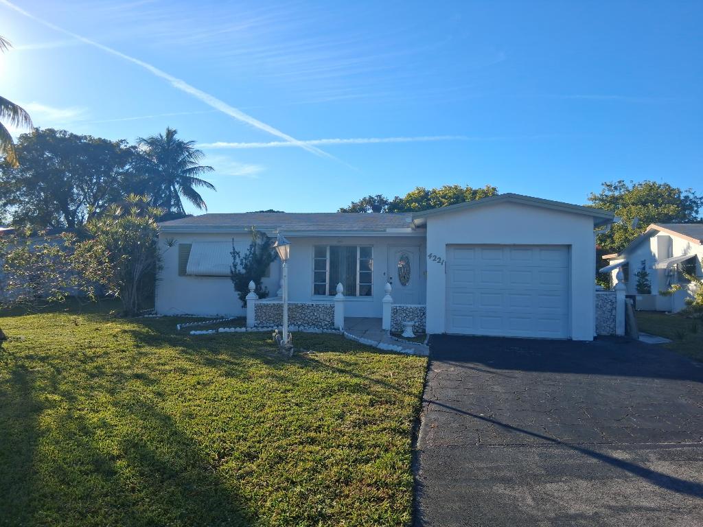 :Spacious 2-bedroom 2 bath home with Large Florida Room located in a quiet community nearby restaurants, shops and easy access major highways. Enjoy your peaceful spacious backyard. The home features a 2-drive way, den converted to 3rd bedroom, HURRICANE SHUTTERS THROUGHOUT, ROOF and AC has been SERVICED October 2025. Great potential. Easy to show 24-hour notice.