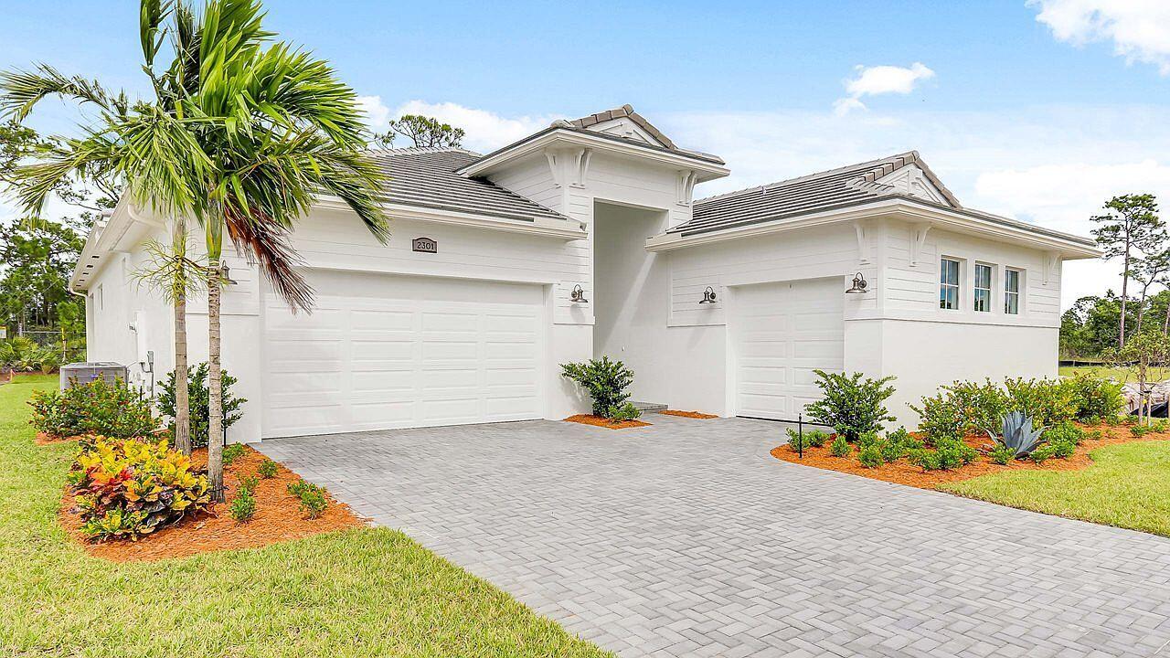 Welcome to this stunning 3-bedroom, 3-bathroom home located at 2301 SE Canopy Cove Ln in Port St. Lucie, FL. This spacious property boasts an open floor plan with a modern kitchen featuring stainless steel appliances and granite countertops. The master suite offers a luxurious retreat with a walk-in closet and en-suite bathroom. Enjoy the Florida sunshine in the private backyard oasis with a screened-in patio and lush landscaping. Perfect for entertaining or relaxing with family and friends. Don't miss out on this incredible opportunity to own a piece of paradise in Port St. Lucie.