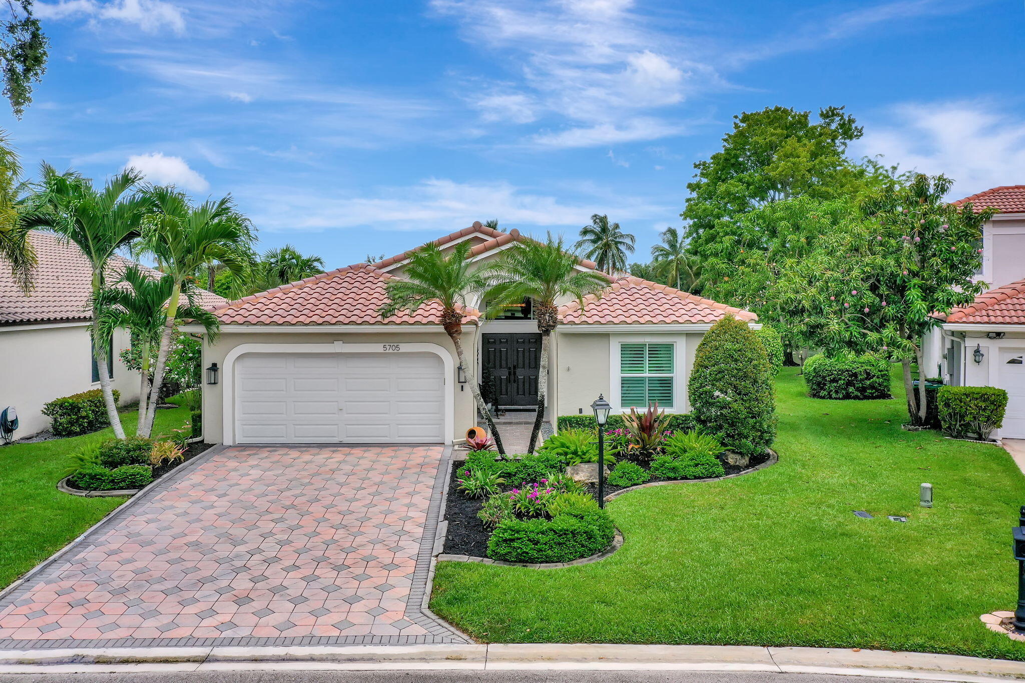 BEAUTIFUL 3/2 WATERFRONT HOME LOCATED IN THE ARBORS COMMUNITY OFFERING MODERN STYLE, SERENE LAKE VIEWS & EXCEPTIONAL UPGRADES. KITCHEN SHOWCASES LIGHT WOOD CABINETRY, CAMBRIA QUARTZ COUNTERTOPS, SS APP. & SEATED ISLAND OVERLOOKING FAMILY ROOM. PRIMARY OFFERS LAKEVIEW, 2 WALK-IN CLOSETS W/BUILT-INS & COMPLETELY REMODELED SPA-INSPIRED BATHROOM: DOUBLE-SINK VANITY, SEPARATE SOAKING TUB, SEAMLESS GLASS WALK-IN SHOWER & DESIGNER FINISHES. THE GUEST WING IS COMPLEMENTED WITH UPDATED BATHROOM: MODERN TILEWORK, STYLISH VANITY & TUB/SHOWER COMBO W/ GLASS ENCLOSURE. 2-CAR GARAGE W/OVERHEAD STORAGE RACKS, FULLY IMPACT WINDOWS/DOOR & GARAGE DOOR + SOLAR PANEL-ENHANCED ENERGY EFFICIENCY. THE THOUGHTFUL UPGRADES, MODERN FINISHES & TURN KEY READY MAKE THIS HOME A RARE OPPORTUNITY YOU WON'T WANT TO MISS