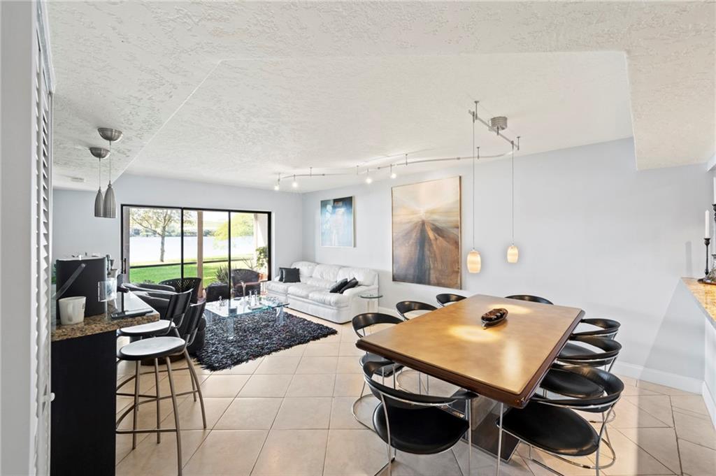 Enjoy the sunsets with this amazing lakeview from your patio. This totally remodeled 2/2 on first floor, beautiful updated kitchen. Resort Style Gated community 24 hours guard on site, 5 community pools, tennis courts, jacuzzi,, boat storage. Must see it