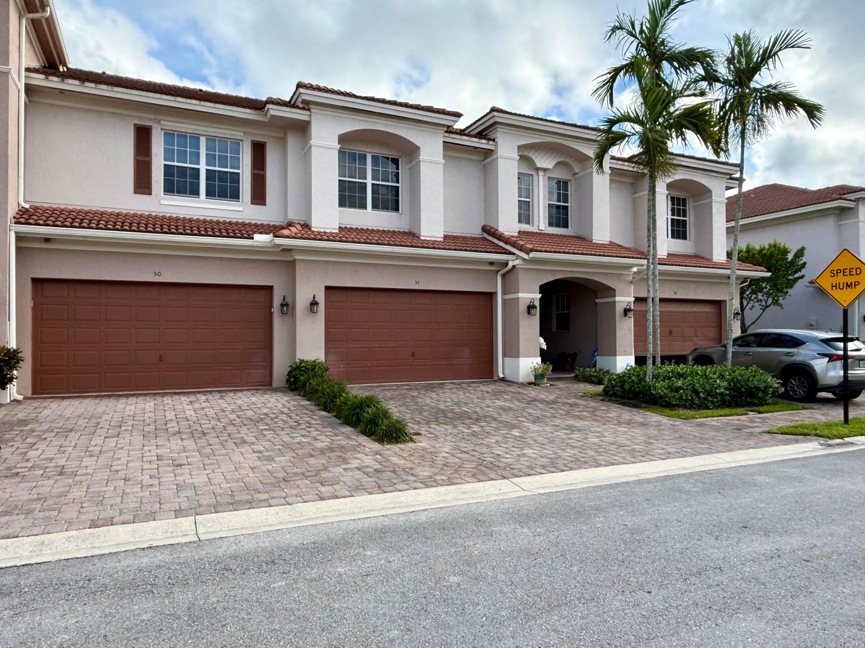 FABULOUS TOWNHOME WITH 2-CAR GARAGE & NO REAR NEIGHBORS!Located in the pet-friendly community of Carriage Pointe, this spacious 3BR/2.5BA townhome offers 2,209 living sq. ft., a 2-car garage, and a 2-car driveway. The covered patio overlooks an expansive backyard with no rear neighbors, providing exceptional privacy. Ideally situated across from the community pool and playground. Features include 10-foot ceilings, a welcoming foyer, oversized living room, dining area, kitchen and laundry room. Upstairs boasts a huge primary suite with walk-in closet and luxurious bath with dual sinks, soaking tub, and separate shower, plus two additional bedrooms, a full bath, and a spacious loft/family room. Low HOA of $189/month includes cable. Conveniently located near Caloosa Park, shopping, and more. This spectacular townhome is located within Carriage Pointe, a beautifully maintained community of 158 Mediterranean-style townhomes. Residents enjoy professionally landscaped grounds, a recreation area, and cable service included in the remarkably low HOA fee of just $189 per month. Tucked away near Caloosa Park, residents have access to expansive recreational amenities including nature trails, softball fields, playgrounds, and lighted courts for tennis, basketball, pickleball, and racquetball. Conveniently located in east Boynton Beach, this home is close to shopping, dining, recreation, major highways, beautiful beaches, and the vibrant downtown district of Delray Beach, known for its eclectic restaurants, boutique shopping, and lively entertainment. Must own for 24 months prior to leasing.