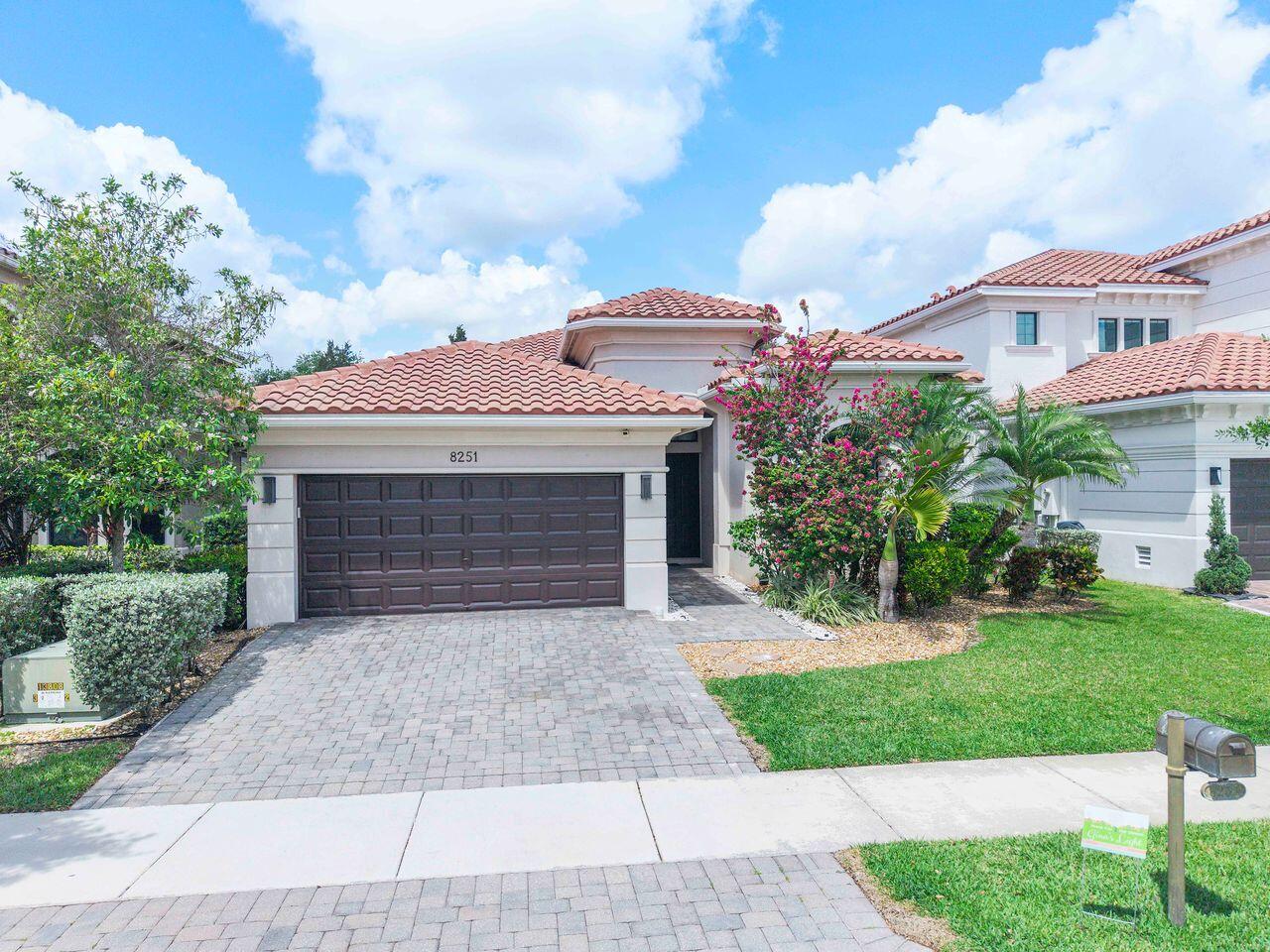 Beautifully updated 4BR/3.5BA home in the highly sought-after Parkland Golf & Country Club. This move-in ready residence features a newer AC (2024), all impact windows and doors, and new laminate flooring in all bedrooms.  Upgrades include updated bathrooms and laundry room, custom closets throughout, and a refreshed kitchen with new refrigerator, dishwasher, and modern stove hood. Freshly painted front and garage doors add to the home's curb appeal.  Enjoy resort-style living in a gated community centered around a Greg Norman Signature golf course, with a 43,000 sq ft clubhouse offering fitness, spa, tennis, pools, dining, and year-round social events.  Don't miss this exceptional opportunity—schedule your showing today!
