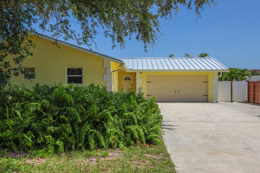 Price above Zestimate reflects significant big-ticket upgrades: Turn-key! Front section built in 1982; back section built in 2005.   NO HOA = No restrictive rules + No surprise assessments!  Brand NEW 6/2026 permitted installations; warranties transferred to Buyer):  ·         METAL roof that last forever + reduce Insurance!  ·         6/2026 SolarFan for air circulation & cooling in Garage.  ·         2 New Rheem central ACs for maximum comfort & energy efficiency.  ·         6/2026 New tub.  ·         6/2026 Sherwin Williams top of the line exterior & interior paints.  ·         2025 Electrical panel.  ·         2025 Chef's kitchen boasts large granite counters = comfortable Eat-In Kitchen + S/S appliances.  ·         2025 Insulation = energy standards for new homes.  ·         Complete Hurricane protection panels for all doors & windows.  ·         Walkable to FAU so you can easily rent out some/all rooms to FAU students for lucrative monthly cashflow!  ·         Front Master suite has its own separate entrance + bathroom + parking; makes great Airbnb or long term rent without disturbing the family.  ·         Second master suite (huge!) has a jacuzzi tub + French doors to POOL.  ·         Glass-enclosed living room can be elegant home office /or an optional 6th bedroom.  ·         Washer/dryer in 2-car garage; Wide & deep driveway accommodates 6 cars.  ·         Located in highly desirable East Boca Raton.  ·         All A+ rated schools including Elementary directly across the street. Minutes to I-95, downtown Boca + Beach.  ·         Whether you want to live the South Florida lifestyle + make extra cashflow /or are an investor targeting consistent multiple streams of rental income under one forever roof, this property delivers! ALL Furnishings convey to Buyer = save money + time!!!  Turn-key. Move-in Ready!!! Rent-Ready!!!
