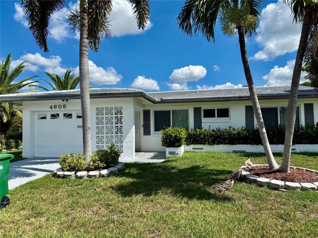 New Roof !Motivated Seller !!! Bring all Offers !!!  This beautifully upgraded 2/2 single family home is situated on a huge corner lot , in the desirable 55 + well maintained community - Mainlands of Tamarac . Home features upgraded bathrooms with sliding glass doors , partially upgraded kitchen with granite counter tops , screened /glassed Patio with flexibility for an office , hurricane impact windows , home is also generator wired and has hurricane shutters .  HOA requires  minimum  Credit Score of 730 .