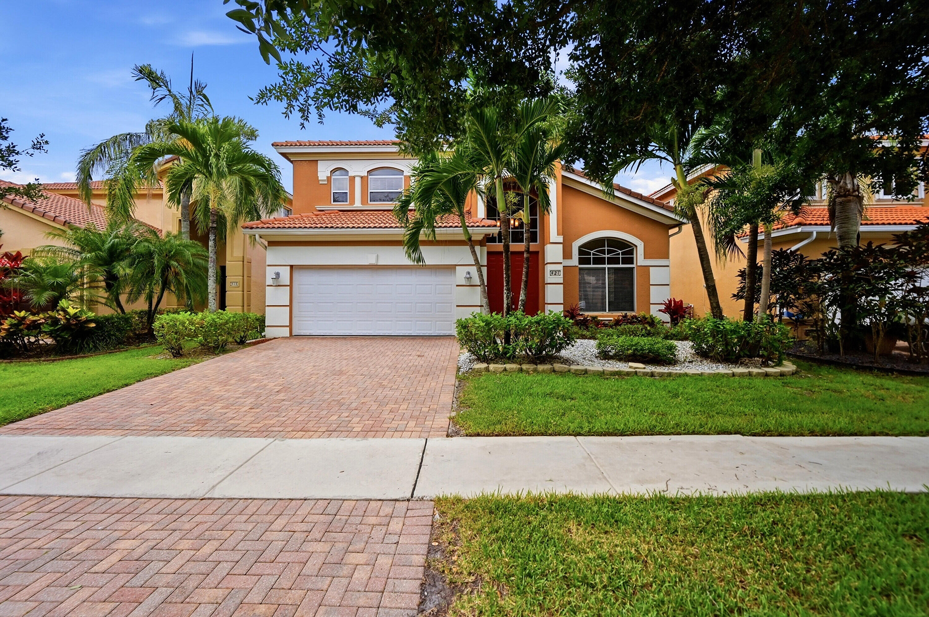 Resort Living at an Unbeatable Value — 421 Gazetta Way, Terracina Nestled in a beautifully maintained, manned-gate community, this spacious 4-bedroom home delivers resort-style living at a surprisingly low HOA — covering a stunning pool, fitness center, tennis & basketball courts, playground, and 24/7 security. Inside, soaring ceilings and hardwood floors set an elegant tone. But the showstopper? A dramatic upstairs loft flooded with natural light through impact windows — perfect as a private home office, creative studio, or flex space limited only by your imagination. Minutes to I-95, beaches, and Downtown WPB. This is the one.