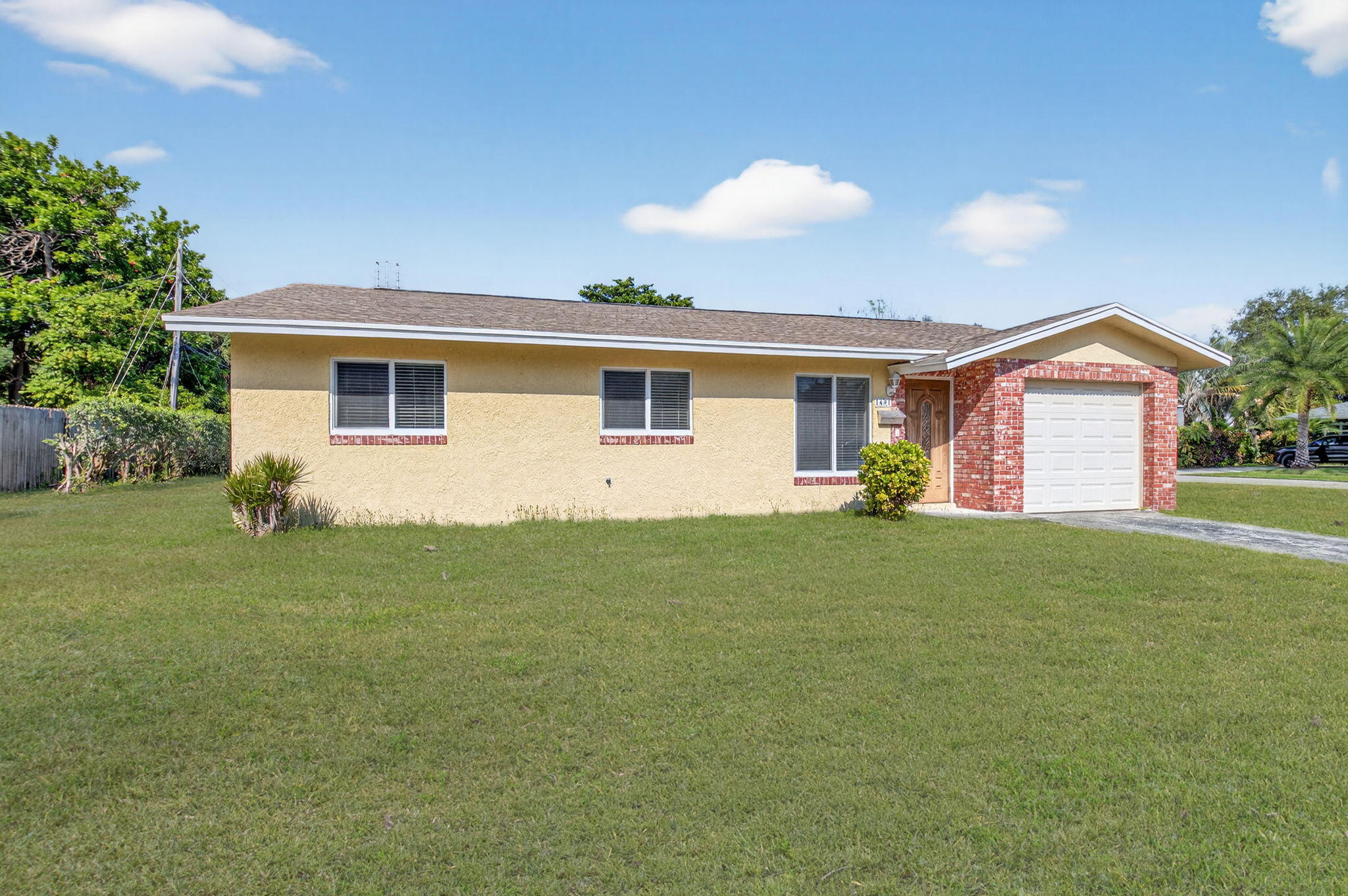 Now offered at $595,000, a great opportunity to own a home in East Boca's desirable Country Club Village with no HOA. Set on an oversized 9,000+ sq ft corner lot, this 3BR/2BA home offers the location buyers are looking for—move in and enjoy it now, then update over time to reflect your own style. Major improvements already in place include a 2024 roof, hurricane-impact windows, and a sliding glass door, adding valuable peace of mind. The property also features an attached garage, space for multiple vehicles in the driveway, and a spacious backyard with room for a pool or expanded outdoor living. With sidewalk-lined streets, street lighting, nearby Meadows Park, and zoning for A-rated Addison Mizner K-8, Boca Raton Community Middle School, and Boca Raton Community High School. Close proximity to I-95, FAU, Boca Regional, Town Center, Mizner Park, Brightline, and the beach just over 3 miles away, this home offers an increasingly hard-to-find combination of lot size, location, and long-term potential in East Boca.