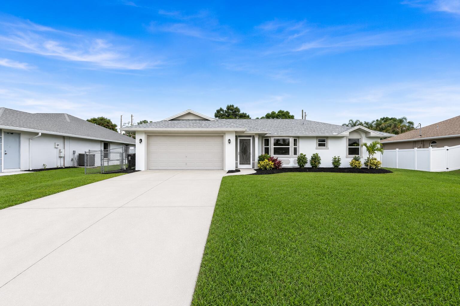 Welcome to the highly desirable Southbend area of Port St. Lucie! This beautifully updated home offers the perfect blend of comfort, style, and location. Situated just minutes from the St. Lucie River, public boat ramps, parks, walking trails, and outdoor recreation, this property is ideal for those who enjoy the Florida lifestyle. Inside, you'll find tasteful upgrades throughout, including a brand-new roof, luxury vinyl plank (LVP) flooring, and numerous modern improvements that make this home move-in ready. The open and inviting floor plan provides comfortable living spaces, while the updated finishes create a fresh, contemporary feel. Whether you're looking for a primary residence, seasonal retreat, or investment opportunity, this Southbend gem offers exceptional val
