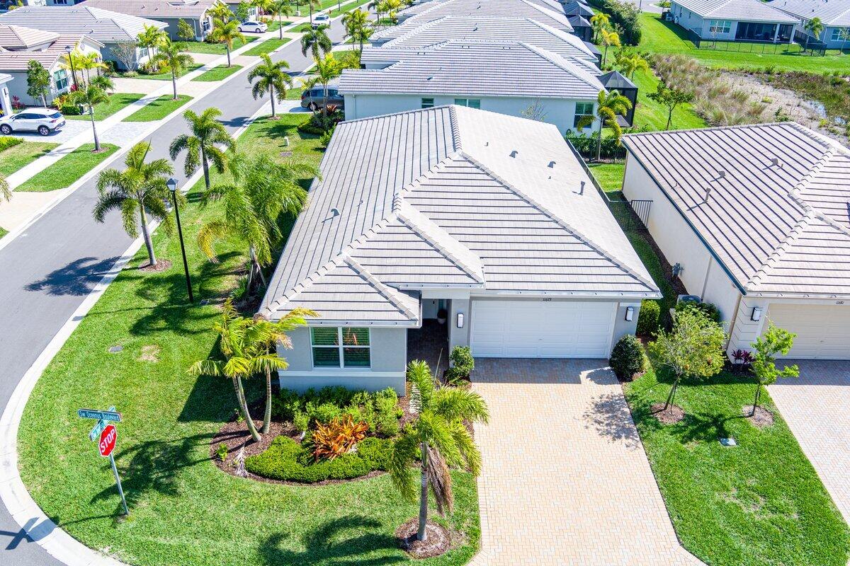 Beautiful Sandpiper model located in the desirable 55+ community of Valencia Grove at Riverland. This well-maintained home offers a premium corner lot, providing added privacy and outdoor space, along with a covered patio, a perfect place for relaxing or entertaining.  This home features impact windows for peace of mind and a modern floor plan with high-quality tile flooring throughout.  Residents enjoy resort- style amenities including clubhouse, pool, fitness center, tennis, pickleball, and more. Conveniently located near shopping, dining, hospital, and major hightways.
