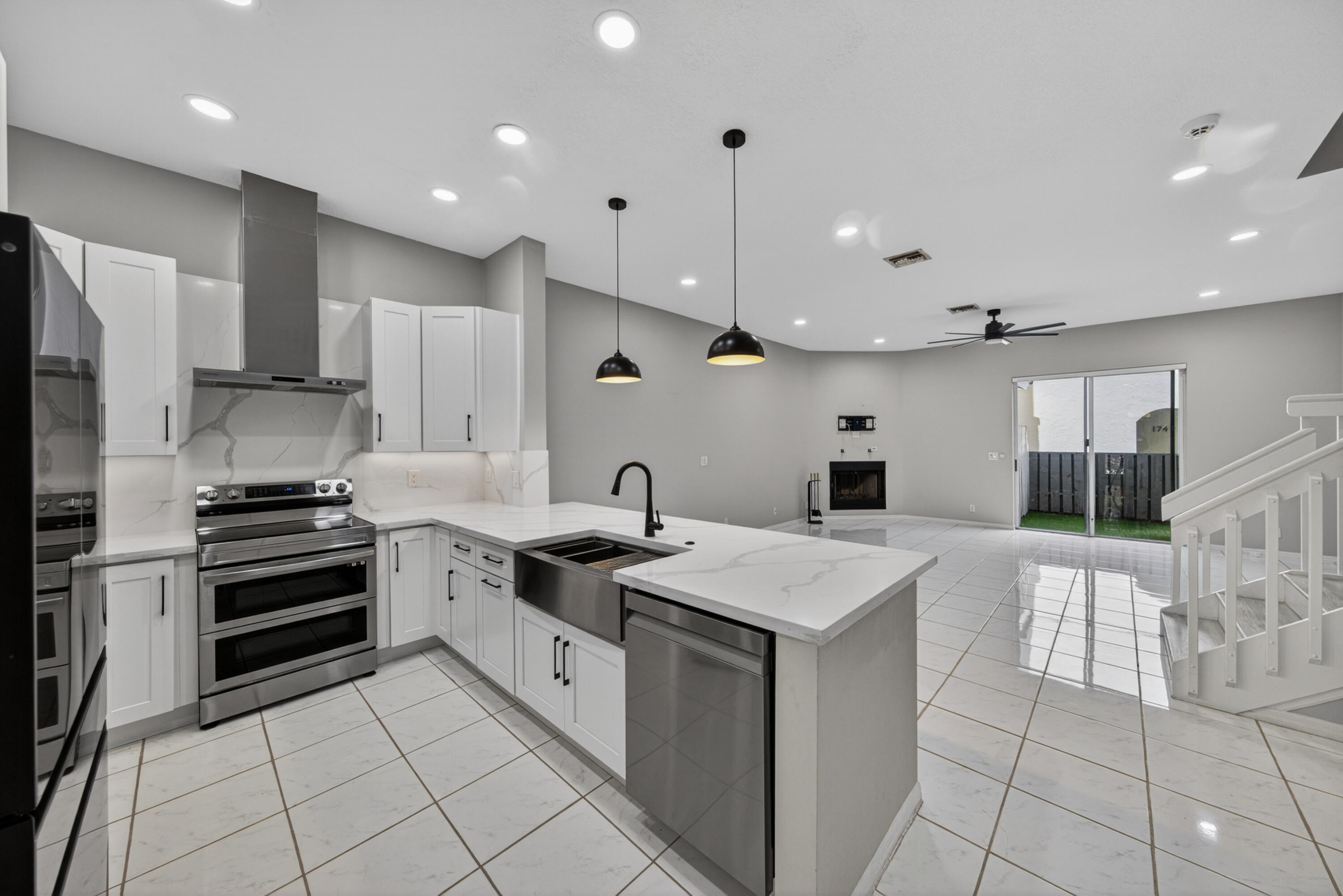 Located in prestigious Victoria Park, this spacious residence features an open floor plan with 2 bedrooms plus office/den and 2.5 baths. The office can easily be converted into a third bedroom. Updated in 2023, the kitchen offers white shaker cabinets, quartz countertops and backsplash, SS farmhouse sink & SS appliances. Features include high ceilings, recessed lighting, plantation shutters, electric blinds, and a wood-burning fireplace in the living room. Washer and dryer replaced in 2022. The patio features artificial grass and room for outdoor furniture. Boutique 13-unit community minutes from Las Olas, Galleria Mall, and Fort Lauderdale Beach.1 garage space + oversized driveway for 4 cars. Association completed stucco/paint in 2023 and pool renovation in 2024. OK to lease after 1 year.