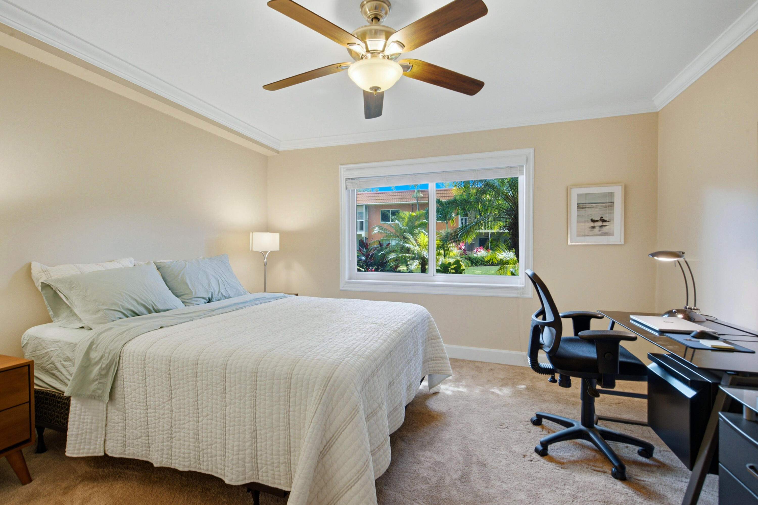 Corner Unit Beauty - Light, Bright & Just Right! Welcome to this spacious 2-bed, 2-bath first-floor corner unit with a beautiful garden view. Enjoy impact windows and doors that fill the home with natural light. It's the BEST PRICED unit with the lowest HOA fees in the entire complex, making it an incredible value! Washer and dryer are allowed, giving you the flexibility to install your own and add convenience. Ideally located just minutes from the beach, major roads, top restaurants, shopping, and vibrant nightlife. The community has been recently updated with fresh paint and new carpets, creating a clean, modern feel. Great opportunity for homeowners or investors—schedule your showing today before it's gone!