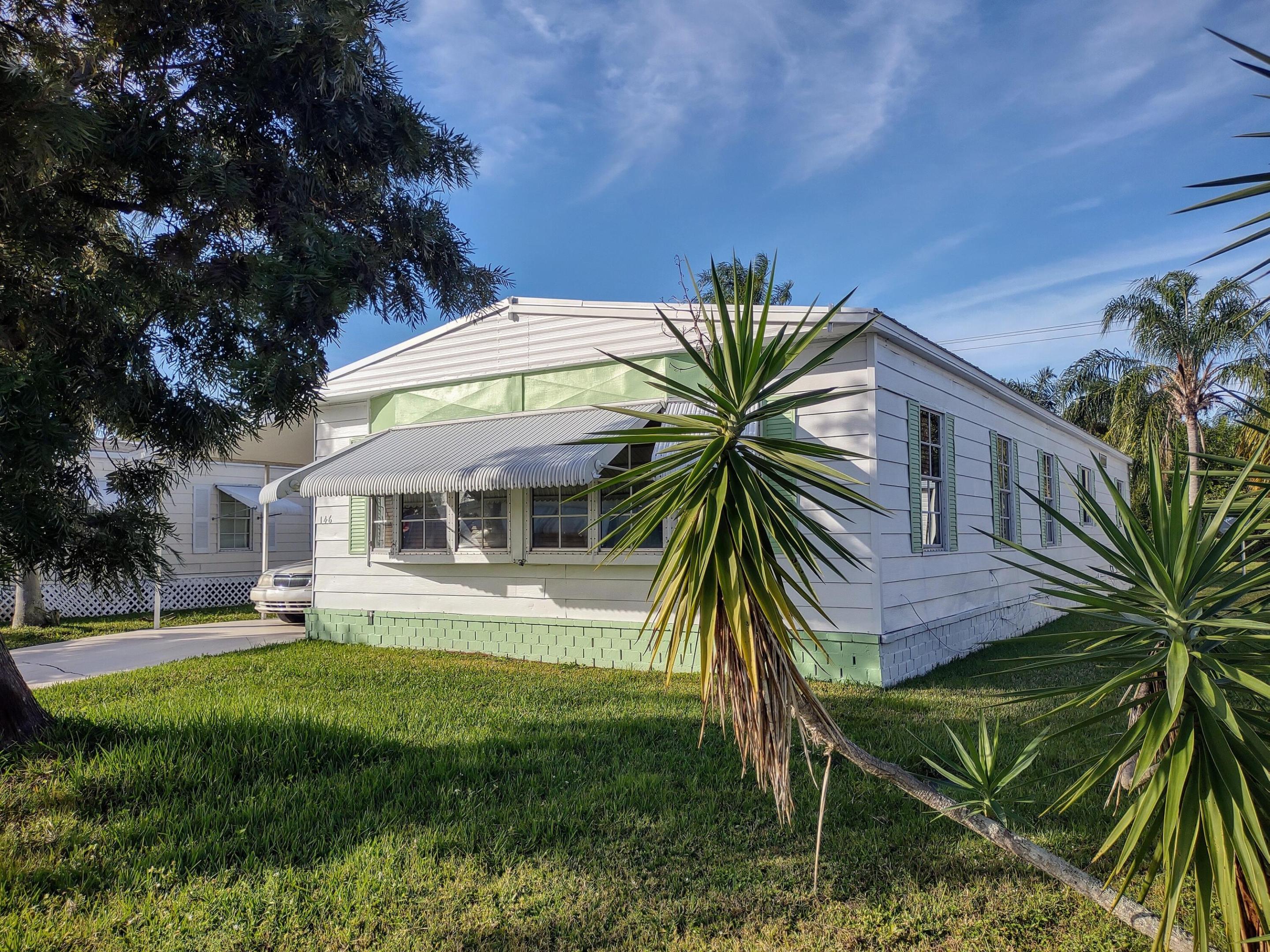 55 Plus Community. This move-in ready home has 2 bed 2 bath, NEW METAL ROOF 2002, New carport Dec 2025 New Ductwork and Motor on AC Unit 2022. No soft spots. Floor tiles in most of the house. Bonus Sun room. Market rent (new owner): $1,021.87 a month for 12 months