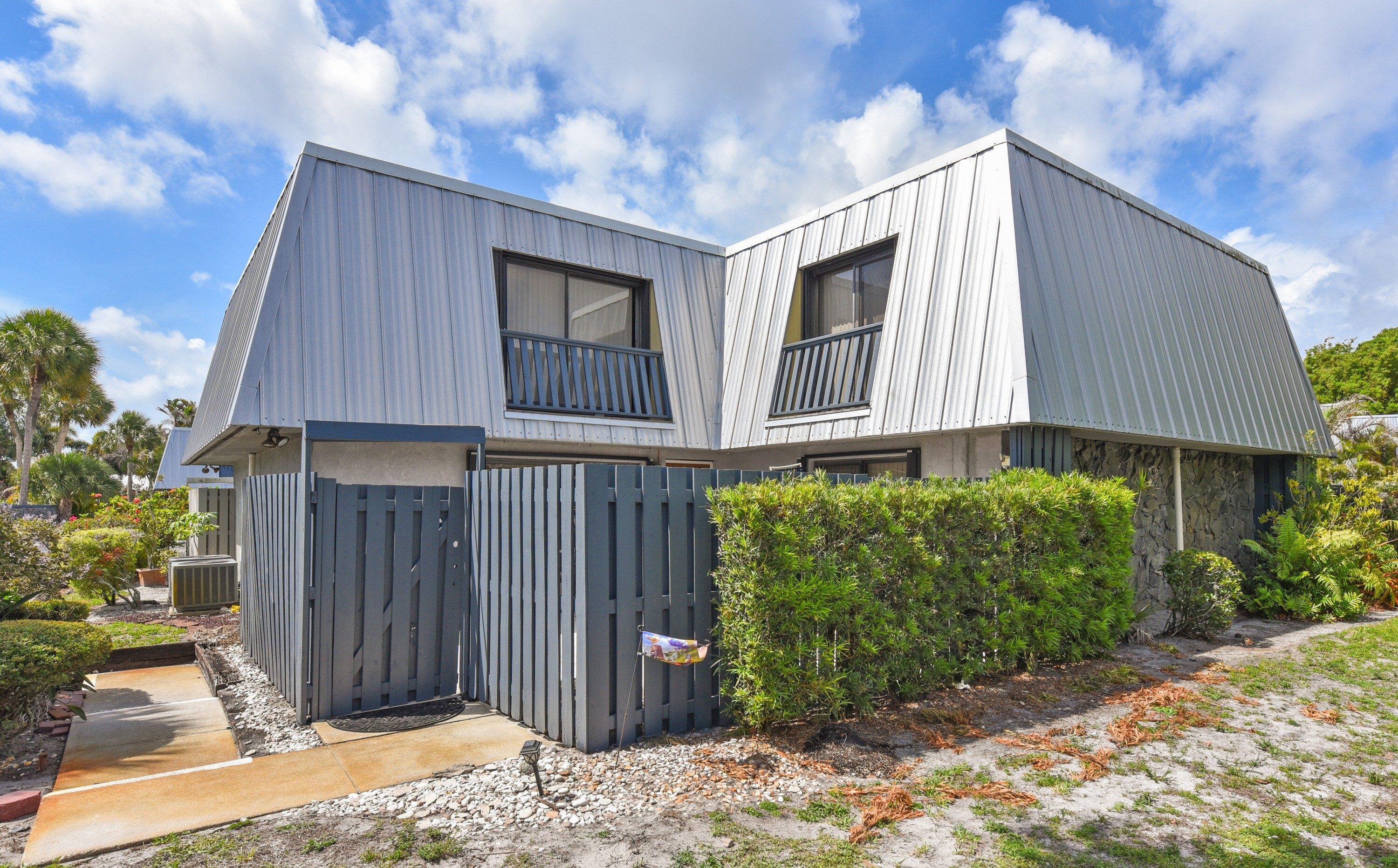 A great value in The Courtyards in Stuart! This updated 2BR/2.5BA townhome is in a pet-friendly community just minutes from beaches, downtown Stuart, dining, marinas, and medical facilities. Features include two large bedrooms, each with en-suite baths and Juliet balconies overlooking the private fenced courtyard. The HOA includes insurance, plus cable, lawn care, and access to the community pool. Low-maintenance living in a prime Stuart location.