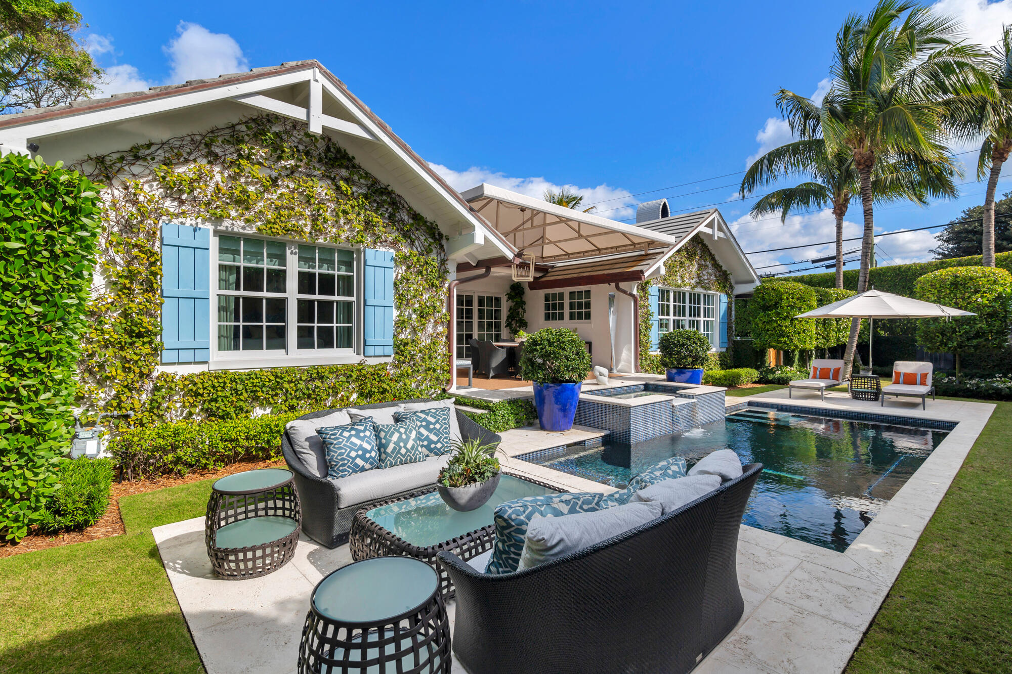 Completely renovated jewel box in the heart of town, this 3-bedroom, 2.5-bathroom home with an office is situated on a spacious 10,000-square-foot lot. Featured in Luxe magazine, the residence boasts an open layout with abundant natural light, southern sun exposure, and a custom-built bar perfect for entertaining. The spacious kitchen, featuring Calcutta Gold marble, opens to a covered loggia that overlooks the impeccably landscaped garden and pool. Additional highlights include vaulted ceilings, a private master bedroom veranda, and a one-car, air-conditioned garage. Enjoy the private pool, spa, and oversized yard, along with access to a private beach and the scenic Lake Trail. Just a short walk to Worth Avenue, The Four Arts, and the recreation center, this home offers the ultimate Palm Beach lifestyle.