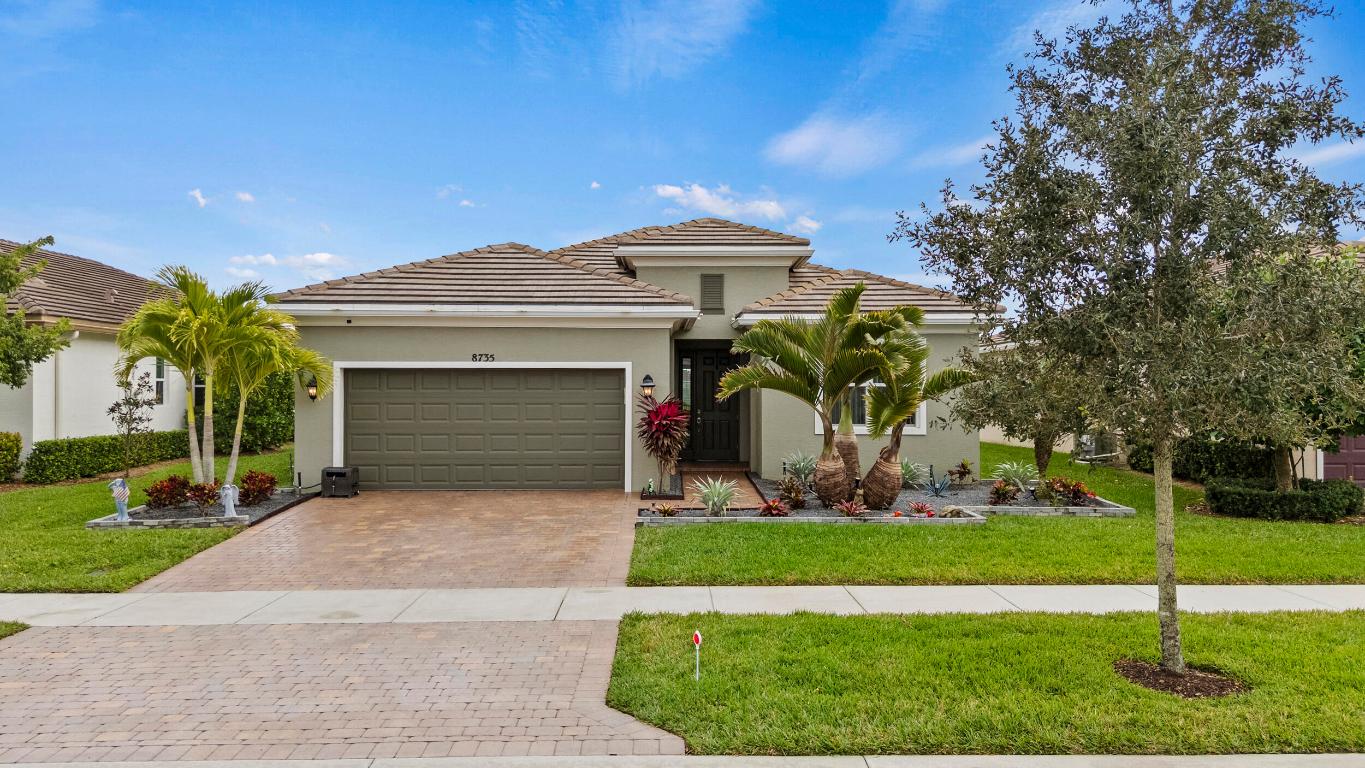 Stunning 2019 Kolter Homes residence featuring the desirable Conner model in the highly sought-after PGA Village Verano community. This well-maintained 2 bed / 2 bath + flex room home offers 1,731 sq ft of open living space with tile roof and a premium waterfront lot showcasing serene lake views. Enjoy true Florida living with a private heated pool and solar panels for added energy efficiency. The functional floor plan provides excellent flow for everyday living and entertaining. Located in a gated, resort-style community with access to pools, fitness centers, tennis, pickleball, and more. A rare opportunity for waterfront living.