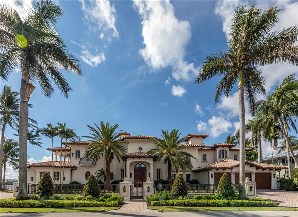 Situated on the Intracoastal Waterway with quick, direct ocean access and what has been acclaimed by many as the best view in Fort Lauderdale, this magnificent point lot estate provides a supremely desirable location in exclusive Rio Vista boasting 300' of prime water frontage and the coveted southeast exposure. With 8300 sq ft of opulent living space, the home presents room after room of unbridled luxury and magnificent views of the waterway to inspire and delight. Two-story walls of glass in the living room create a vibrant tapestry of sky and water, while long views of the Intracoastal are enjoyed from nearly every room in the house. The property recently underwent an extensive series of major upgrades and renovations bringing it to the highest standard of South Florida living.
