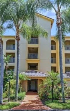 Don't miss this rarely available top floor, water view condo with covered parking space!  Walking distance to Juno Beach, Pet friendly w/restrictions. Investor friendly with monthly leasing avail.  2Bed/2Bath split plan, laundry & additional unassigned parking. New German luxury vinyl plank & tile floors, new 6 /3.4 baseboards, Quartz countertops galore, freshly painted interior. A/C & roof replaced in 2022. Large Master suite w/water view, walk in closet double sinks, updated fixtures & wood cabinetry.  Guest bath has new modern vanity, seamless shower glass, tile & updated fixtures.  Guest bedrm has a Murphy bed. Updated kitchen new soft close wood cabinetry, European tile backsplash, SS appliances, modern layout. Storm shutters, balcony storage closet. Welcome to the Florida lifestyle.