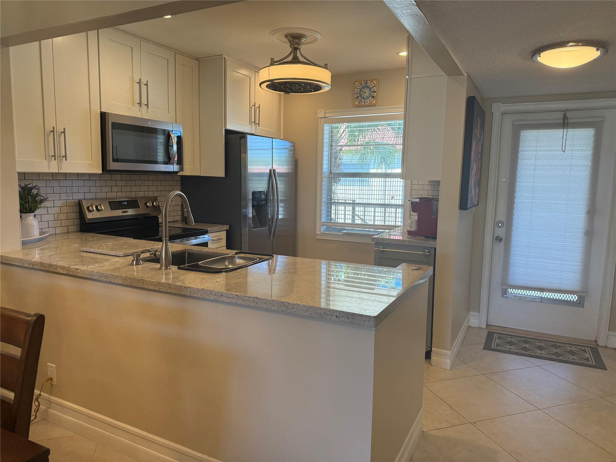 VILLAGES OF ORIOLE ABBEY CONDO - Residential