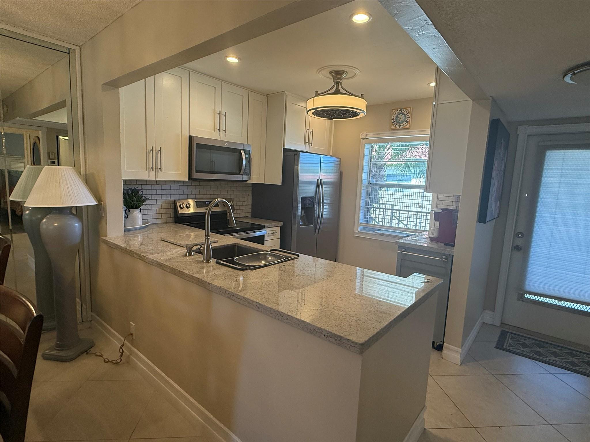 VILLAGES OF ORIOLE ABBEY CONDO - Residential