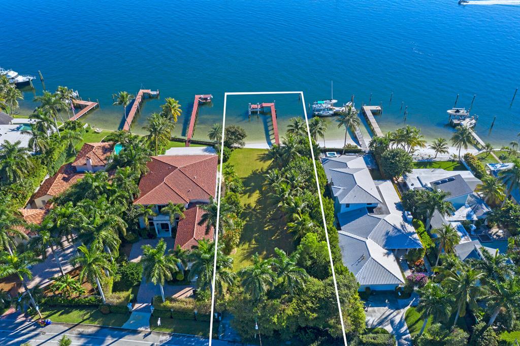 AMAZING INTRACOASTAL WATERFRONT PARCEL WITH DOCK AND BOAT LIFT. Exciting opportunity to build a 12,000+ SF masterpiece with unobstructed wide water views directly across from Palm Beach island. The property has approximately 80-FT of water frontage and no fixed bridges. Conveniently located just minutes away from The Breakers, Palm Beach Inlet, PBI Airport, and PB Yacht Club.