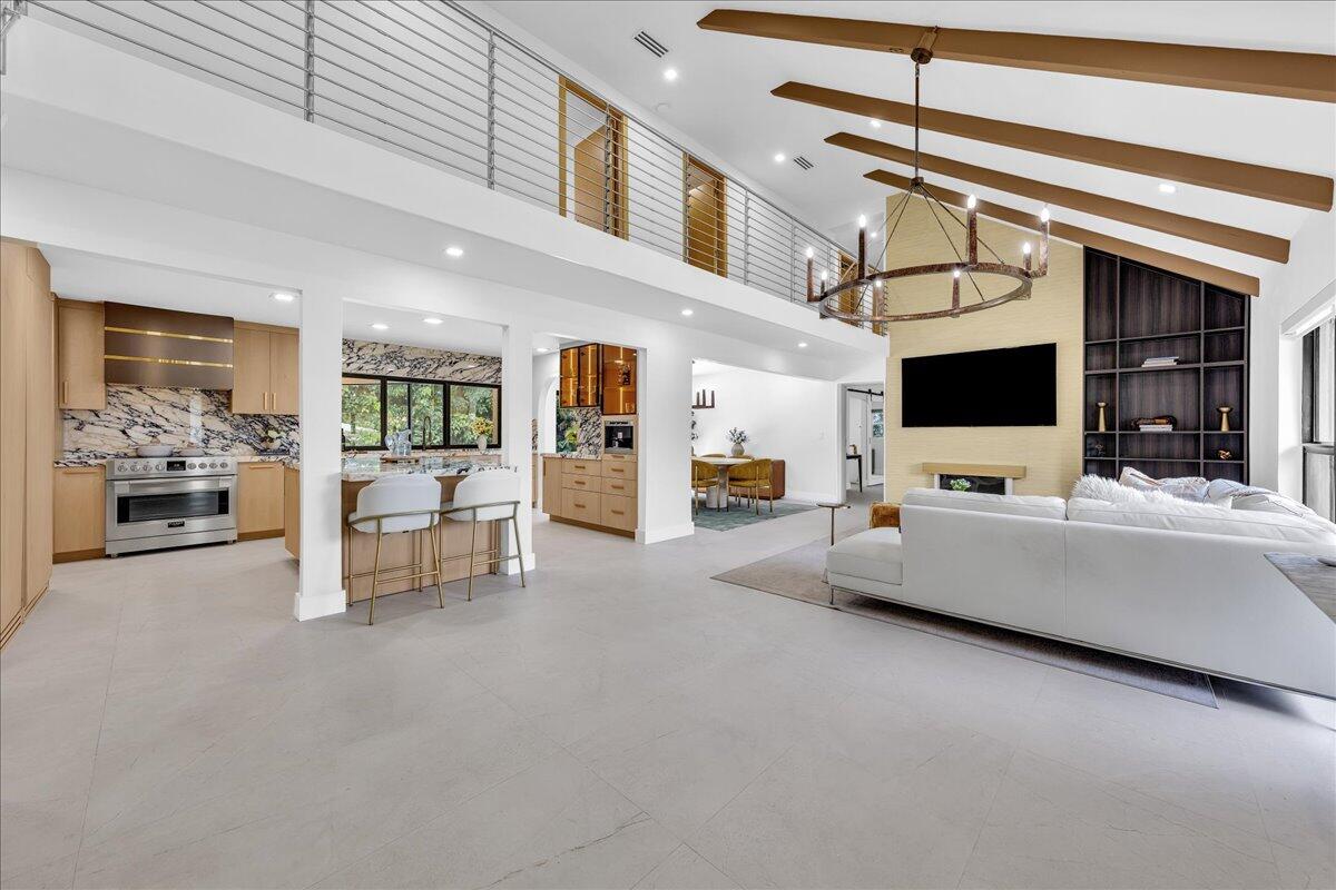 Experience refined European contemporary design in this fully renovated, minimalist-inspired residence in the prestigious Tequesta Country Club. Thoughtfully redesigned from top to bottom, this 5-bedroom, 5 full bath CBS home offers approximately 3,400 sq. ft. of light-filled living space with clean architectural lines, designer finishes, open-concept living, and a 2-car garage. Located in one of the hottest communities in Jupiter/Tequesta, directly across from Jupiter Island and minutes to Tequesta Village, beaches, waterfront dining, and boating. Optional golf membership available with no mandatory club fees & community boat dock available. Turnkey luxury, exceptional location make this a rare opportunity.