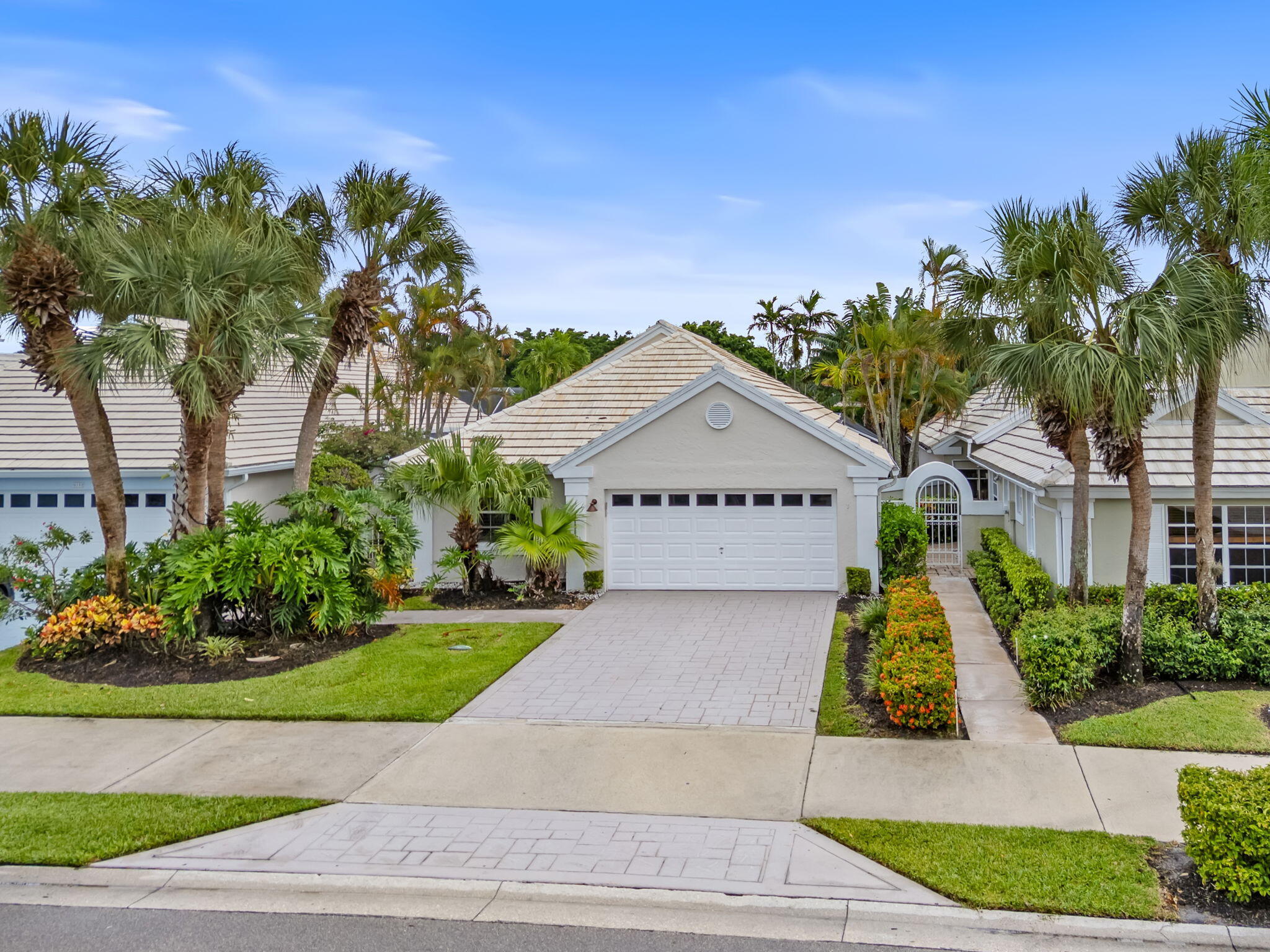 Welcome home to this 3-bedroom, 2-bathroom waterfront home in The Colony at Breakers West, where comfort, style, and a resort-inspired lifestyle come together. You'll love the open-concept layout, soaring volume ceilings, and coastal-inspired colors that create a bright, inviting atmosphere from the moment you walk in. The split floor plan provides privacy, while the main living area and primary suite showcase serene lake views and direct access to your private screened-in pool and spa. Picture mornings spent sipping coffee by the water, afternoons hosting cookouts at the built-in outdoor kitchen, and evenings unwinding in the spa. Breakers West is unique because club memberships are optional, giving you the freedom to enjoy the community without added commitments. If you choose, memberships are available for golf or sport/social privileges at Breakers West, which include summer access to The Breakers Resort golf, tennis, and beach amenities, or at Mayacoo Lakes Country Club.  If you're ready for a home that blends beauty, flexibility, and an unbeatable location, schedule your private tour today.