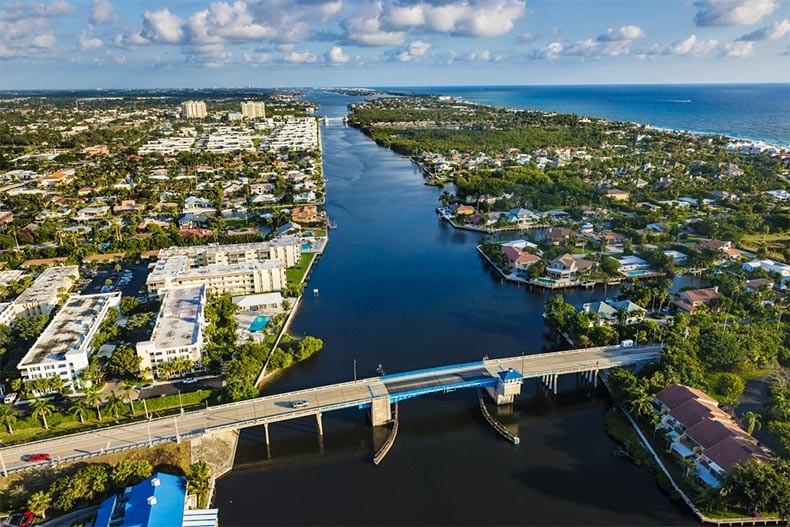 Directly on the INTRACOASTAL waterway. Spectacular 2/2 Condo boasts Intracoastal views. Luxuriously renovated and designed South Beach style with French flair. Turnkey, fully furnished, sold complete with lavish homewares and furnishings. Features Marble flooring throughout. Three brand new flat screen televisions. Upscale kitchen and bath appliances, hardware and design. Samsung cooktop induction oven. High tech security system & cell phone operation. Steps to Intracoastal-front heated pool. A walk to the beach, multiple restaurants, shopping, salons, gym and banks. Close to I95 and downtown Delray Beach. By far the best Location Location Location in Palm Beach County. 55+ HOPA