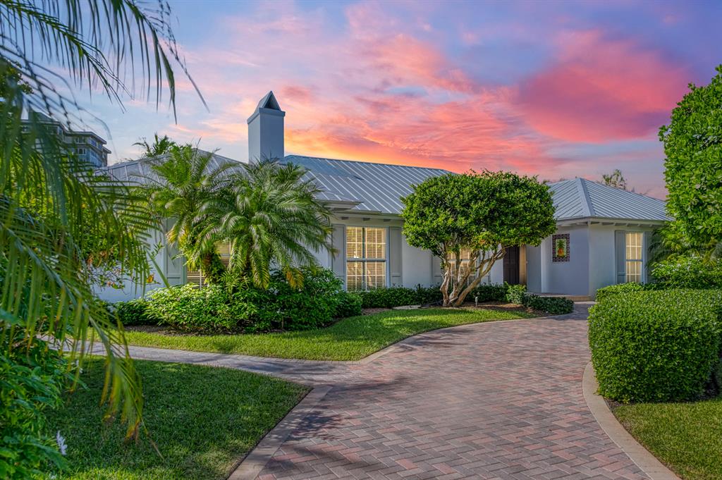 PRICED TO SELL! Direct Intracoastal idyllic home. 110 feet of water frontage & a private dock that can accommodate up to 100 ft yacht. No Wake Zone. Located within walking distance of downtown Delray's Atlantic Ave & just steps to the beach and Atlantic Ocean. Master bedroom suite features large master bath and walk-in closet with separate office space. Split floor plan guest bedrooms have en suite baths. Kitchen overlooks outdoor covered lanai that's perfect for dining, entertaining & year round sunsets. Large lot size lends itself to a spacious private yard & lush garden areas - truly tranquil and relaxed living. Two car garage. Marble, hardwood floors & plenty of closet storage throughout the home. Security system. Full sized laundry room with utility sink & second full refrigerator.