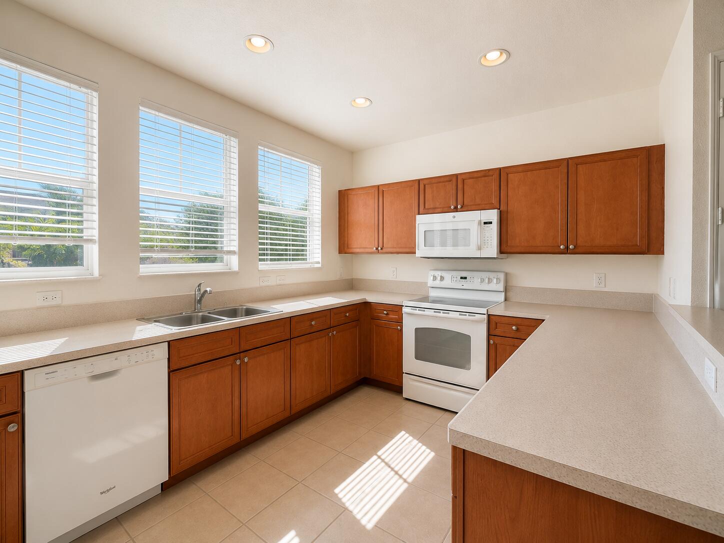 Welcome to 780 Marina Del Ray #4, an annual unfurnished rental offering spacious living in a prime West Palm Beach location. This 2 bedroom with den townhome features an open and functional floor plan with generous living and dining areas, a bright kitchen with ample cabinet and countertop space, spacious bedrooms, and an attached garage for added convenience.  Enjoy natural light throughout, neutral finishes, and a layout that's perfect for both everyday living and entertaining. The primary suite offers a comfortable retreat with an en-suite bath and generous closet space, while the additional bedrooms provide flexibility for guests, a home office, or family.  Conveniently located just minutes from Downtown West Palm Beach, Palm Beach Outlets, I-95, Shopping, Dining, Beaches, and PBA.
