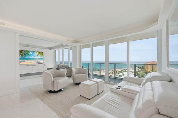 Welcome to Paradise! Enjoy spectacular southeast ocean views from this beautifully renovated contemporary condominium in the highly sought-after "22 Stack." Completely redesigned with new electrical, plumbing, mechanical systems, and custom finishes throughout. The open-concept floor plan features a designer kitchen with quartz countertops, imported backsplash, and premium appliances. Luxurious bathrooms offer double vanities and spa-style showers with rain shower heads. Additional highlights include Smart Home technology, Bosch washer and dryer, high-impact glass, and turnkey furnishings. Building amenities include a 24-hour front desk attendant, oceanfront heated pool, garage parking, and direct beach access.