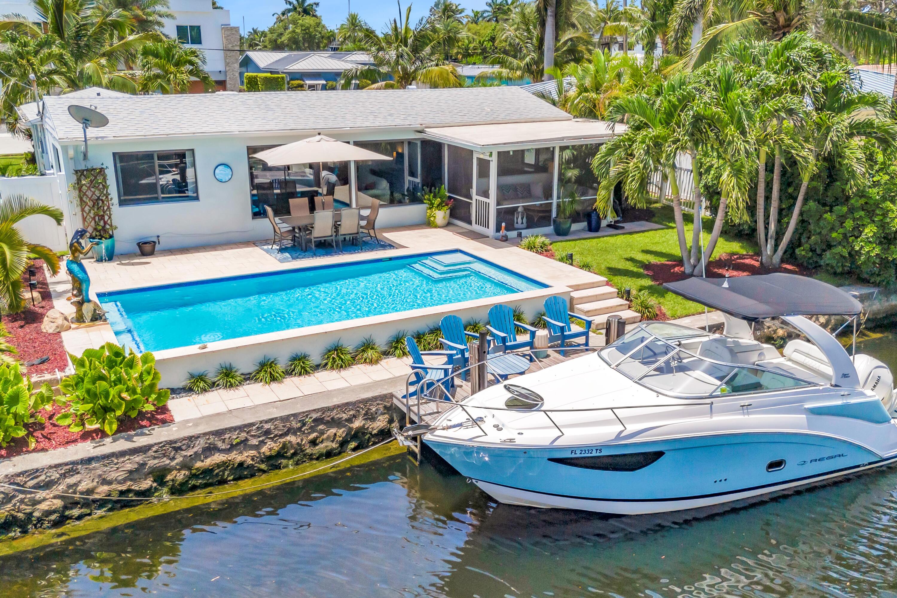 Beautifully renovated Old Florida-style Mid-Century home located in the sought-after boating community of Citrus Isles, offering 65 feet of deep-water frontage, private dock, and unrestricted ocean access. Completely move-in ready with updated interiors in keeping with the old Florida look, fresh landscaping with custom lighting, full impact windows and doors, new roof  (2020), and a new private pool. Enjoy the benefits of a well-maintained community with no HOA fees. Minutes from Fort Lauderdale Airport, Las Olas Boulevard with upscale restaurants and shopping, Brightline, and award-winning beaches. A unique opportunity to own a turnkey waterfront home with deep-water access in the heart of Fort Lauderdale.