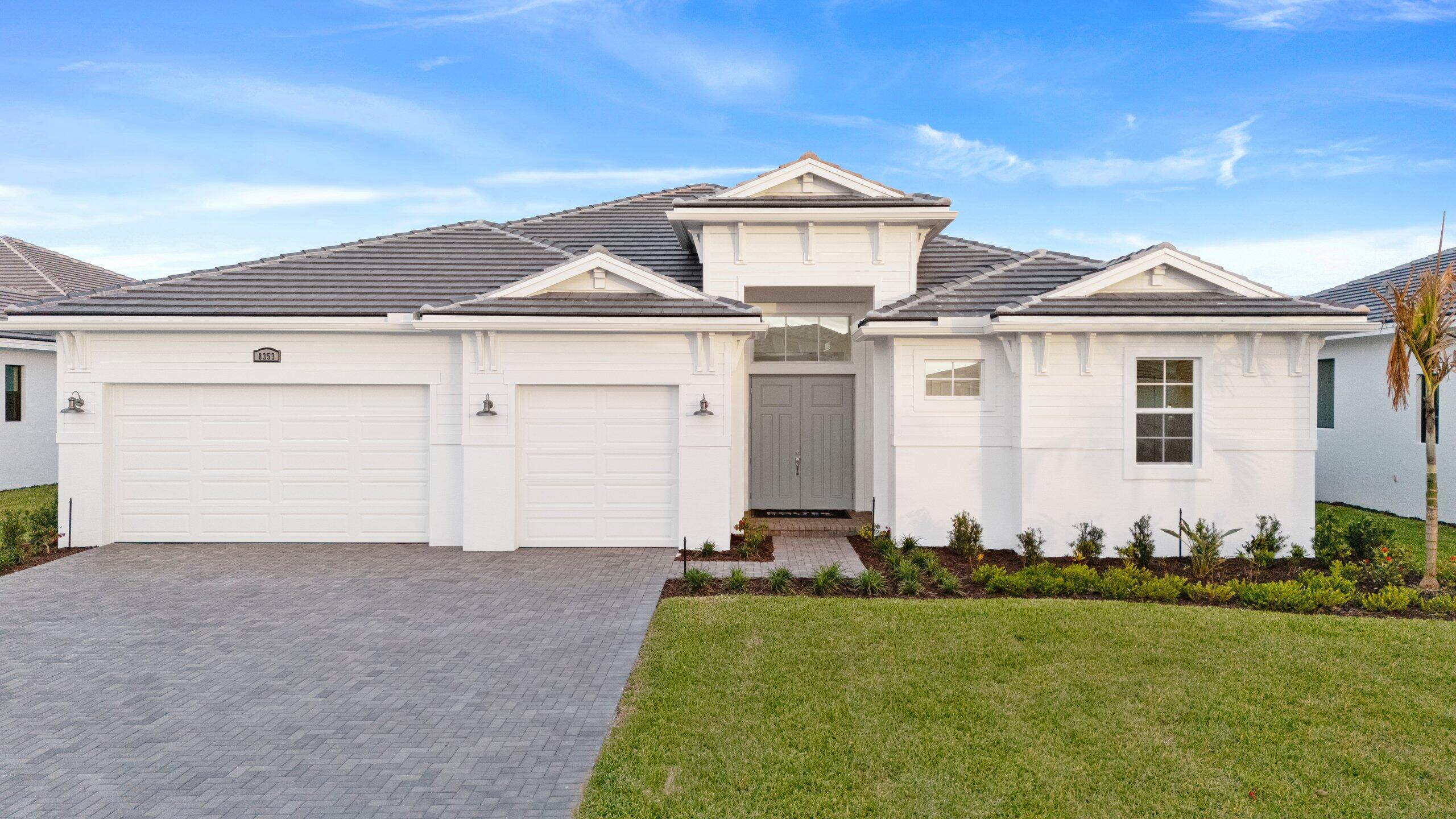Welcome to refined Florida living in this beautifully upgraded home, set within a gated community just minutes from Tradition Square, offering outstanding dining, shopping, and entertainment. The chef-inspired kitchen features upgraded cabinetry, premium GE Profile appliances, and thoughtful storage, flowing seamlessly into the dining and living areas where a striking 74" electric linear fireplace serves as a stylish focal point. The owner's suite provides a spa-like retreat with a freestanding soaking tub, while outdoors, a private backyard oasis awaits with a custom summer kitchen, granite countertops, Blaze grill, refrigerator, and stainless-steel sink—all enclosed by a 5' privacy wall for relaxed, year-round enjoyment. Discover luxury living at PGA Village Verano, with resort-style amenities: private Pickleball Center with 27 courts, fitness facilities, indoor and outdoor pools, tennis, bocce, and basketball courts. Includes access to PGA Golf Club for its members, plus billiards, library, kitchen, and a full-time Lifestyle Director.