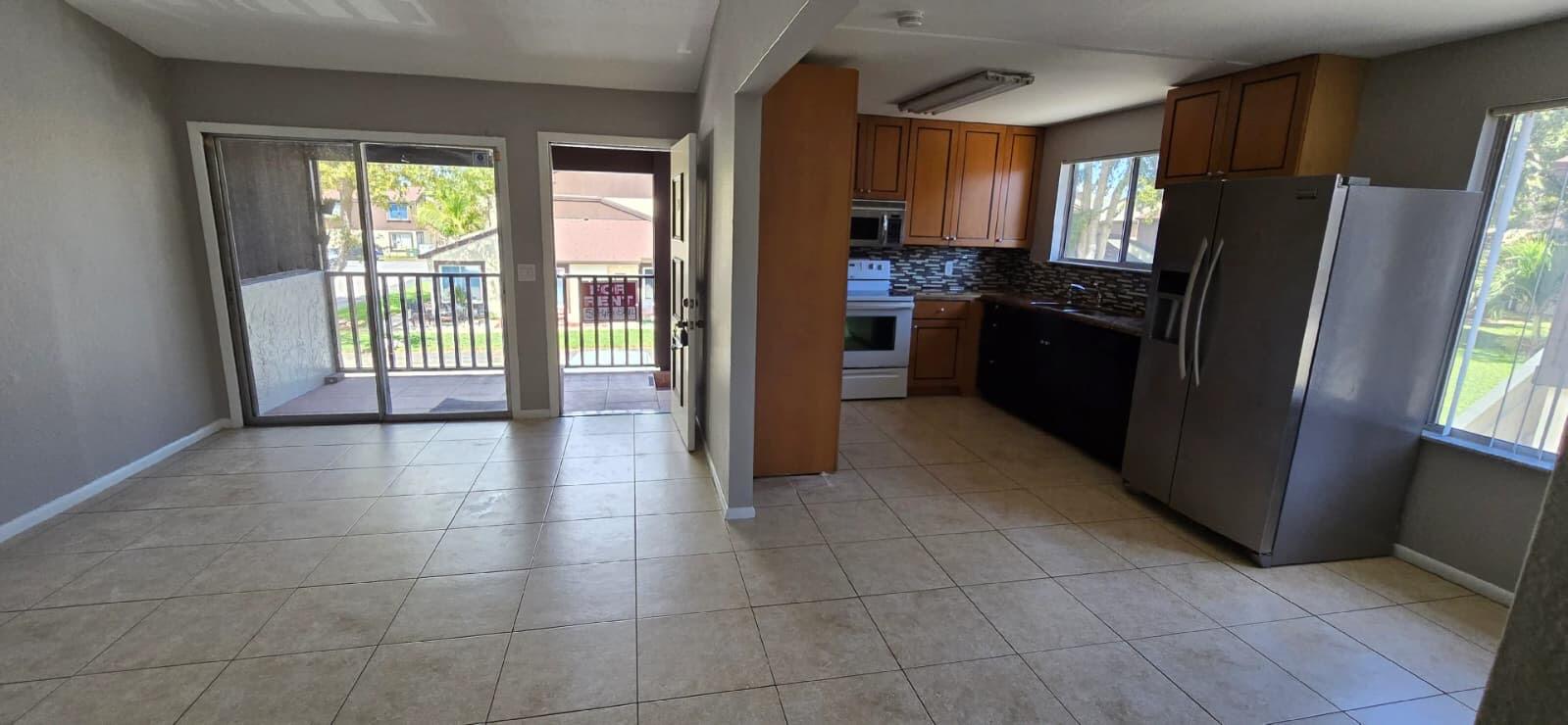 Welcome to this charming 2-bedroom, 1-bathroom condo offering comfort, convenience, and exceptional value! Featuring tile flooring throughout, this home is easy to maintain and perfect for everyday living. Enjoy the convenience of a community laundry facility, a resort-style swimming pool, and beautifully maintained common areas. The HOA provides outstanding value by including water, roof maintenance, exterior building maintenance, and common area upkeep, giving you peace of mind and a low-maintenance lifestyle. Ideally located near shopping, dining, schools, major highways, Palm Beach International Airport, and just minutes from South Florida's beautiful beaches, this property is perfect as a primary residence, seasonal getaway, or investment opportunity. Don't miss your chance to own