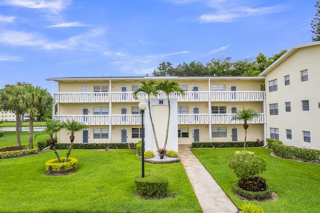 Welcome to Century Village, where the hard part's already done. This 1/1.5 puts you steps from community amenities, restaurants, and activities—no commute, no maintenance headaches. Inside, you'll find laminate flooring throughout, a refreshed kitchen with clean lines, and bathrooms with updated fixtures and finishes. The water views from the unit add a bit of calm to your daily routine. It's designed for someone who wants the independence of their own space without the property management burden. Perfect for fifty-five-plus living done right.