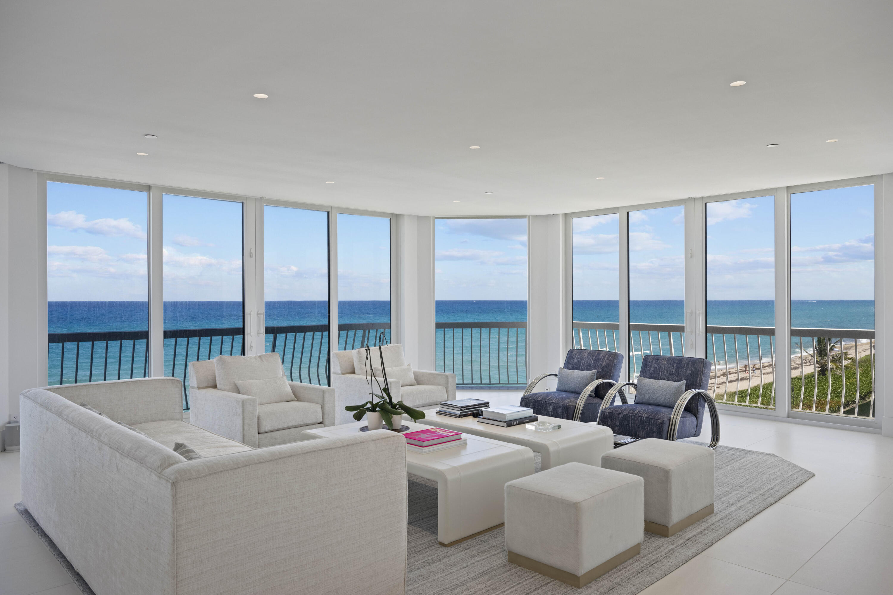 Stunningly renovated to perfection at Sloan's Curve in a contemporary style, this 3/3 has the most far reaching panoramic ocean and beach views and a desirable southeast exposure. Quality details and beautifully furnished on a high floor with an oversized terrace, you will be mesmerized from morning till night and feel as if you're on the most luxurious yacht! The openness of the floorplan in the reimagined custom renovation will check every box  including an oversized terrace. Includes a renovated poolside cabana and 2 garage spaces.