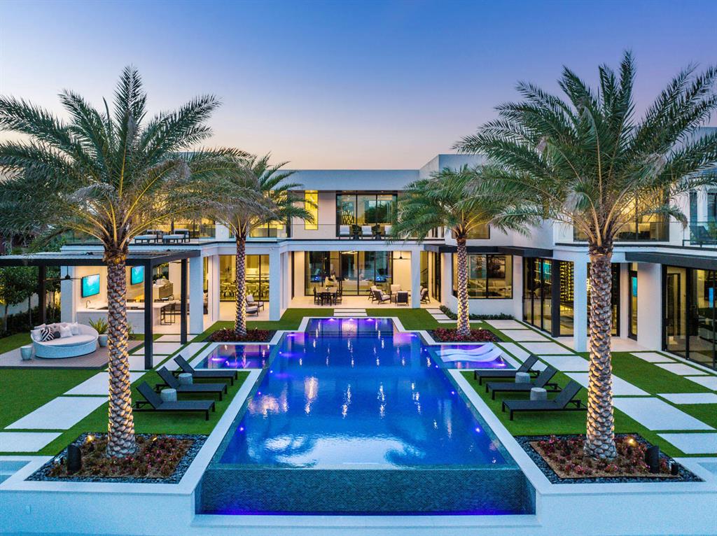 Brand New Waterfront Signature Estate built by SRD Building Corp. This property is located on a premier oversized lot on the Intracoastal within Boca Raton's most prestigious community, Royal Palm Yacht & Country Club. The home is over 10,600 sf of living space and has 6 bedrooms, 7 full and 3 half bathrooms, and a 6-car garage with gated motorcourt. Southeast exposure with 124′ of waterfrontage overlooking the Intracoastal and Capone Island, fully integrated Crestron smart-home system, full house natural gas generator, and exceptional quality and craftsmanship align with every detail throughout this home. Buyer to pay documentary stamp taxes on the deed and title insurance.