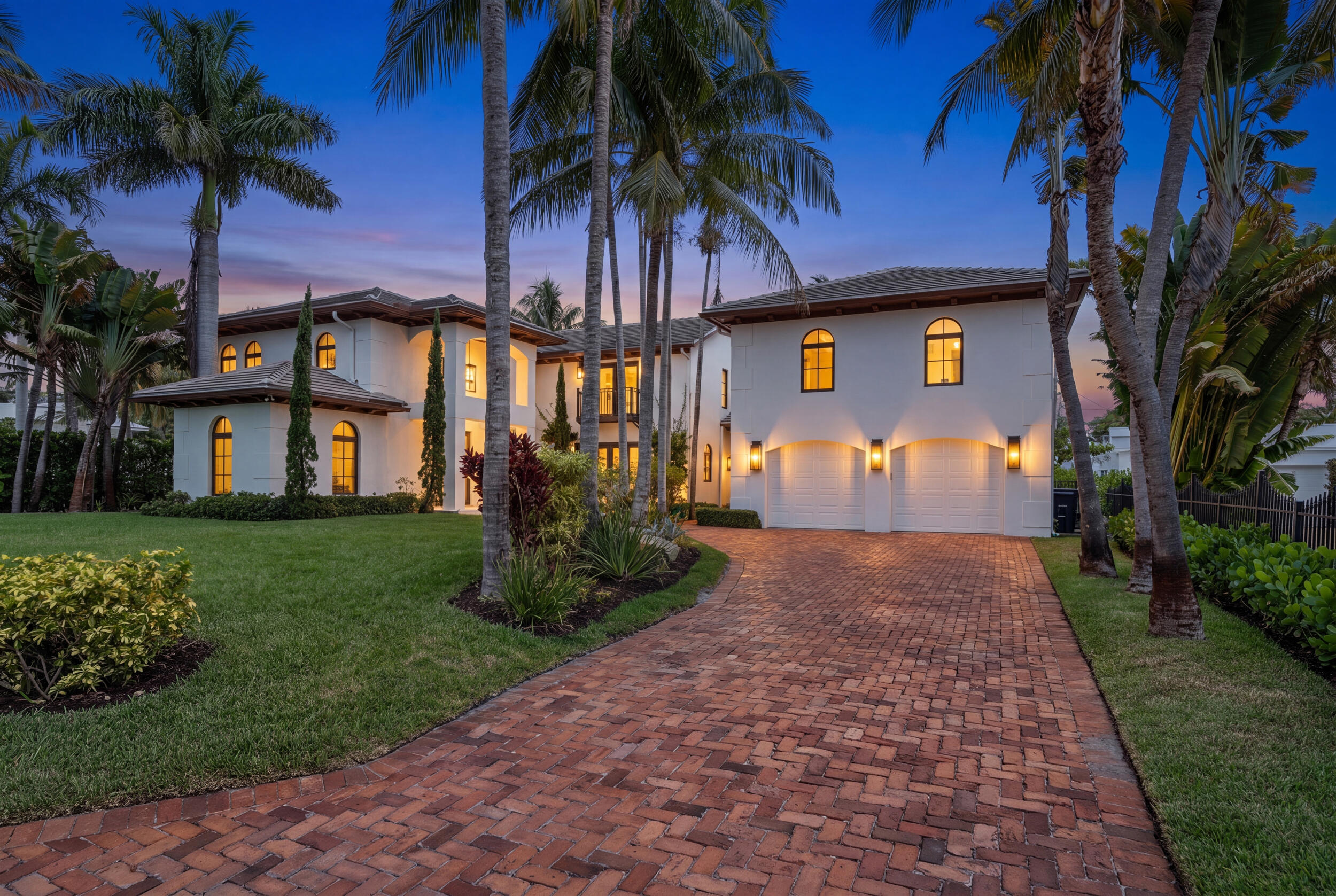 Set on the coveted lake block of Lakewood Road in SoSo, this 4BR/4.5BA home spans over 5,700 square feet following a meticulous two-plus-year renovation where no detail was overlooked. Light-filled and beautifully designed, the home's first floor opens entirely to a backyard oasis featuring a covered patio, summer kitchen, and a 66-foot lap pool. A standout feature is the fully self-contained guest apartment with its own private entrance ideal as a fourth bedroom, in-law suite, or space for adult children, an au pair, or live-in help. Just steps from the Intracoastal walking trail and minutes from downtown West Palm Beach and Palm Beach's renowned dining and shopping, this rare offering is not to be missed.