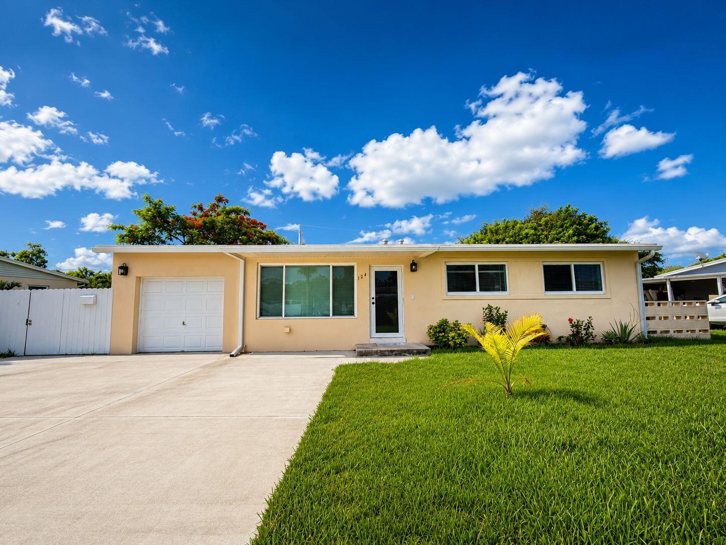 Welcome to 124 Abaco Dr in Palm Springs—an upgraded & freshly painted home tucked in a desirable neighborhood with a prime location near schools, shopping centers, supermarkets, parks, & more! This charming home features 3-bedrooms, 2-bathrooms, new insulation, central A/C—with full impact windows & a brand new driveway & landscaping! Both bathrooms have been tastefully upgraded, & you'll enjoy the ease of in-unit laundry (shed available in the backyard for storage). Best of all, electricity & water are included, offering great value & convenience! Pets are welcome, so bring your furry friends! There is an occupied efficiency attached to the property, completely separated. Don't miss out on this move-in ready gem!